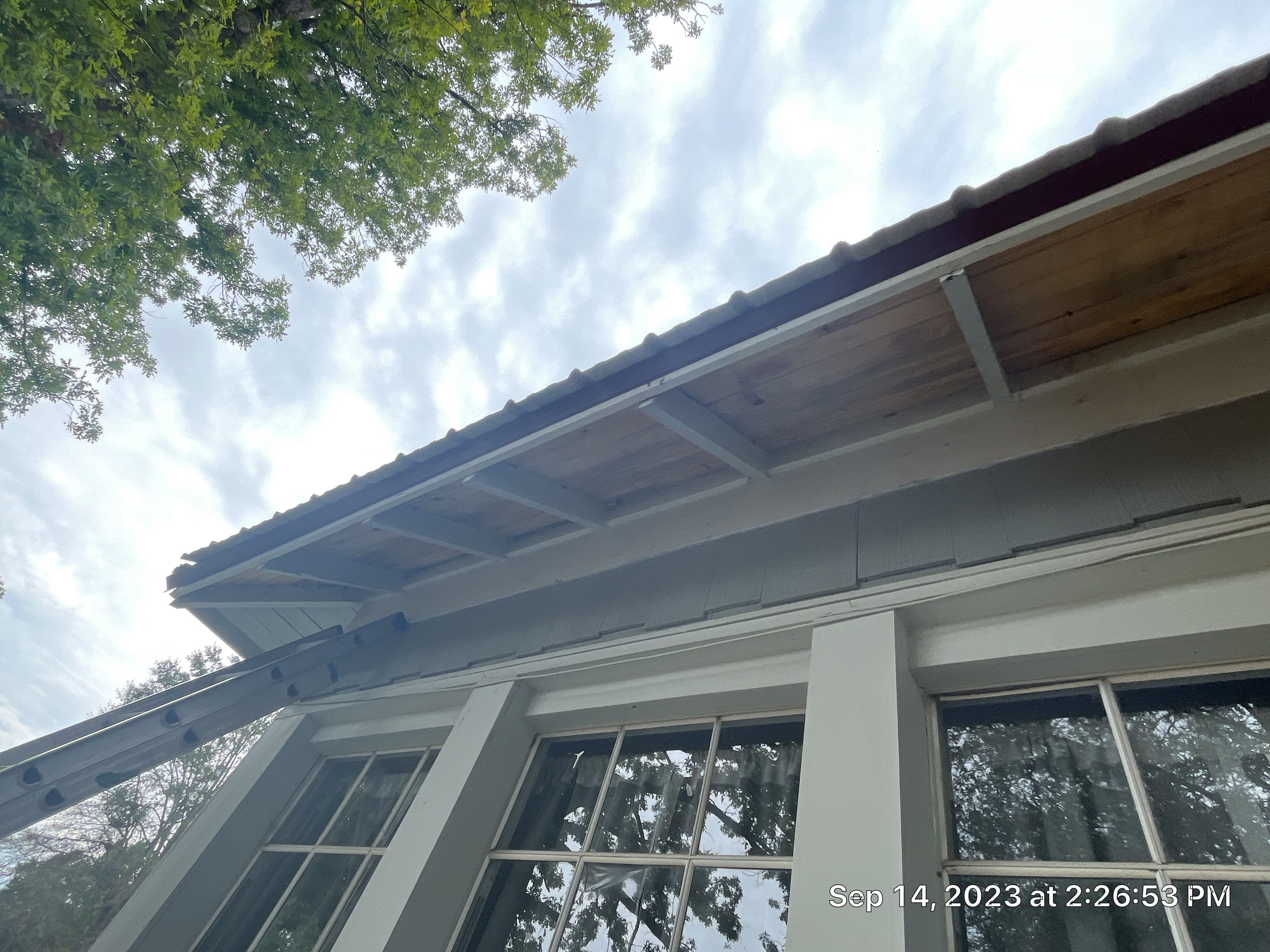 Residential Metal Roof Replacement using Reed's Metals: Colored Residental Panel (Burgundy) by Hostetler Roofing