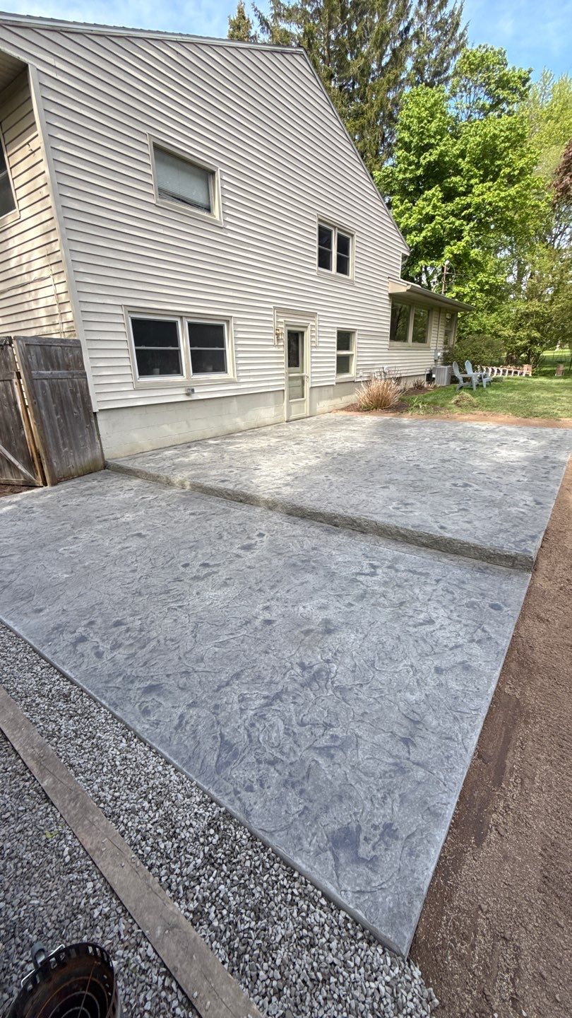 Oxford Slate Two Tiered Patio by NG Masonry & Construction LLC