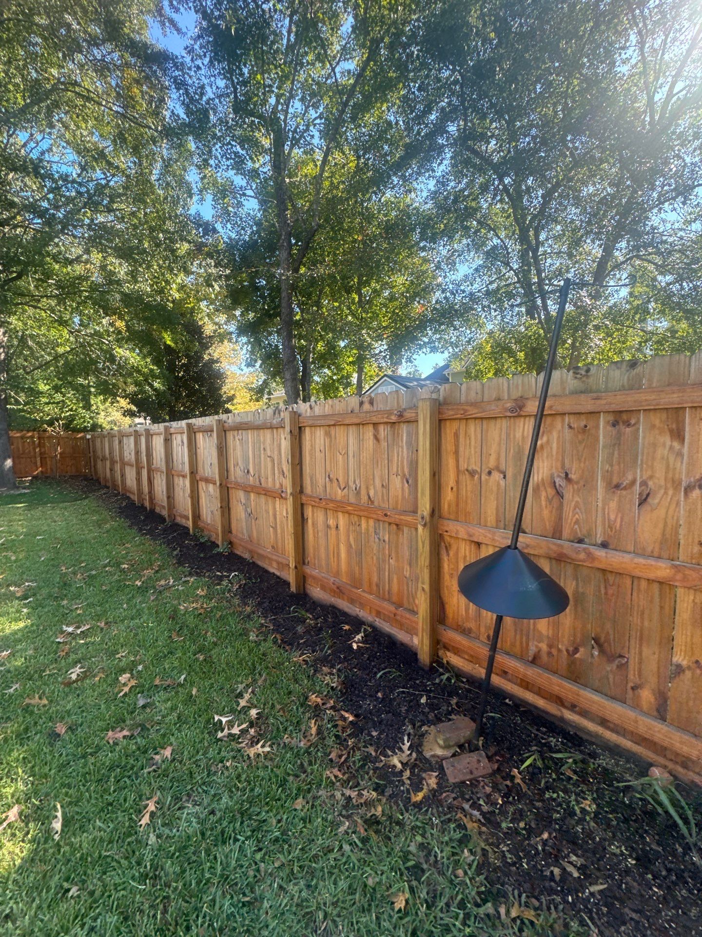 Weathered Fence and Patio using Wood Sealant and Concrete Sealant by DuraSeal
