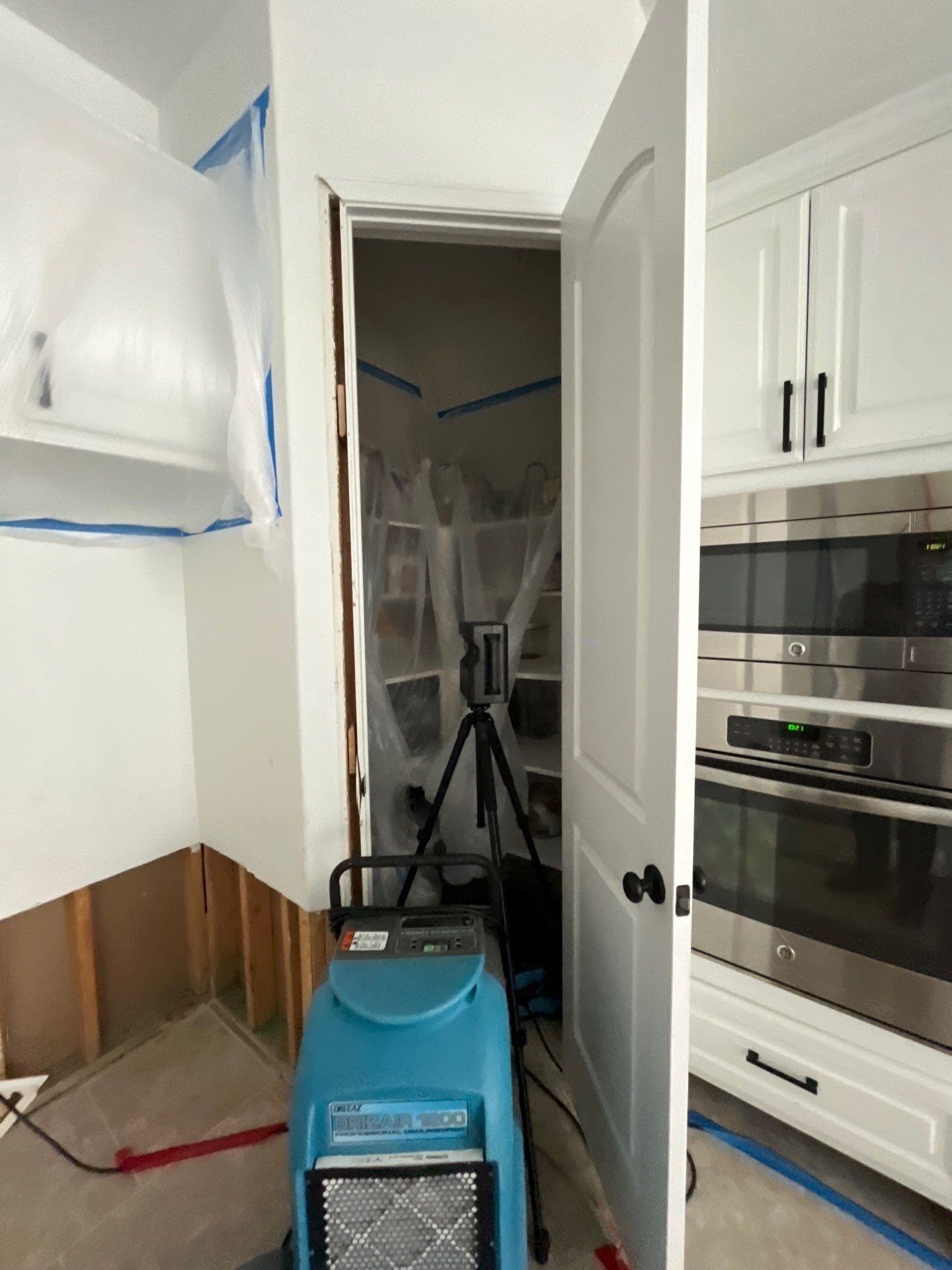 Kitchen Remodel using Water mitigation equipment by L&T General Contractors and Restoration INC