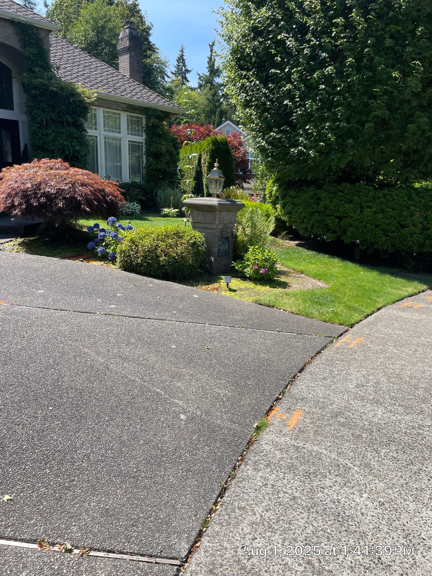 Multi-color Stamped & Sealed Concrete Driveway Renovation | Mukilteo by Jireh Asphalt & Concrete Inc