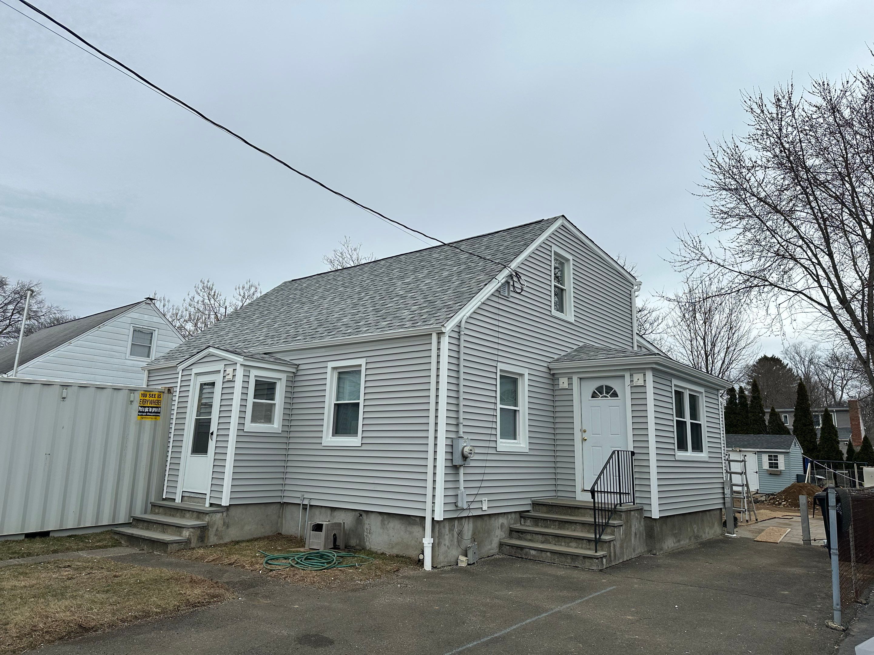Siding Installation using CertainTeed Monogram Vinyl Siding - D4 - Sterling Gray by A Plus Exterior