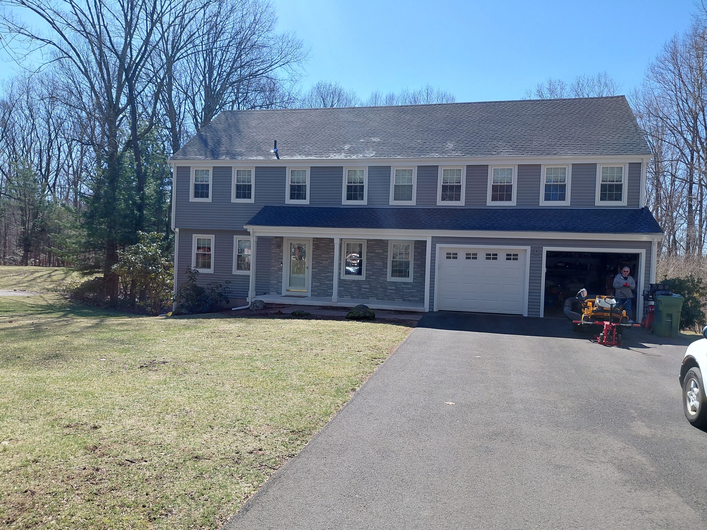 Glastonbury Exterior Renovation with Castle Stone Siding & Stone Entry Upgrade by Turner Home Improvement Contractors, LLC