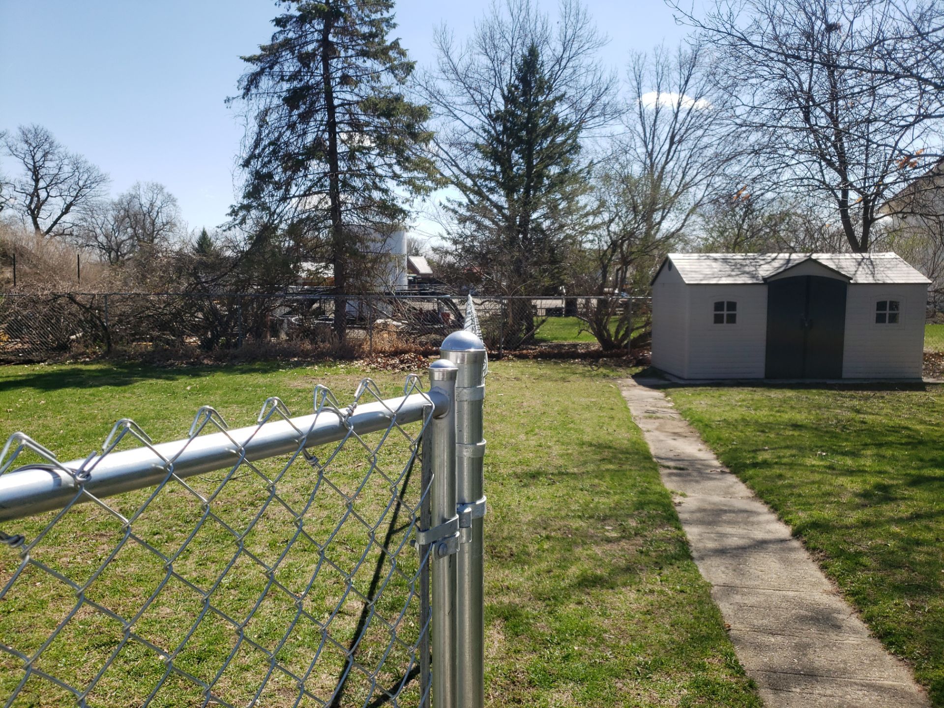 Residential Galvanized Chain Link Perimeter Fencing and Gate Installation by Perfect Picket Fence and Stain