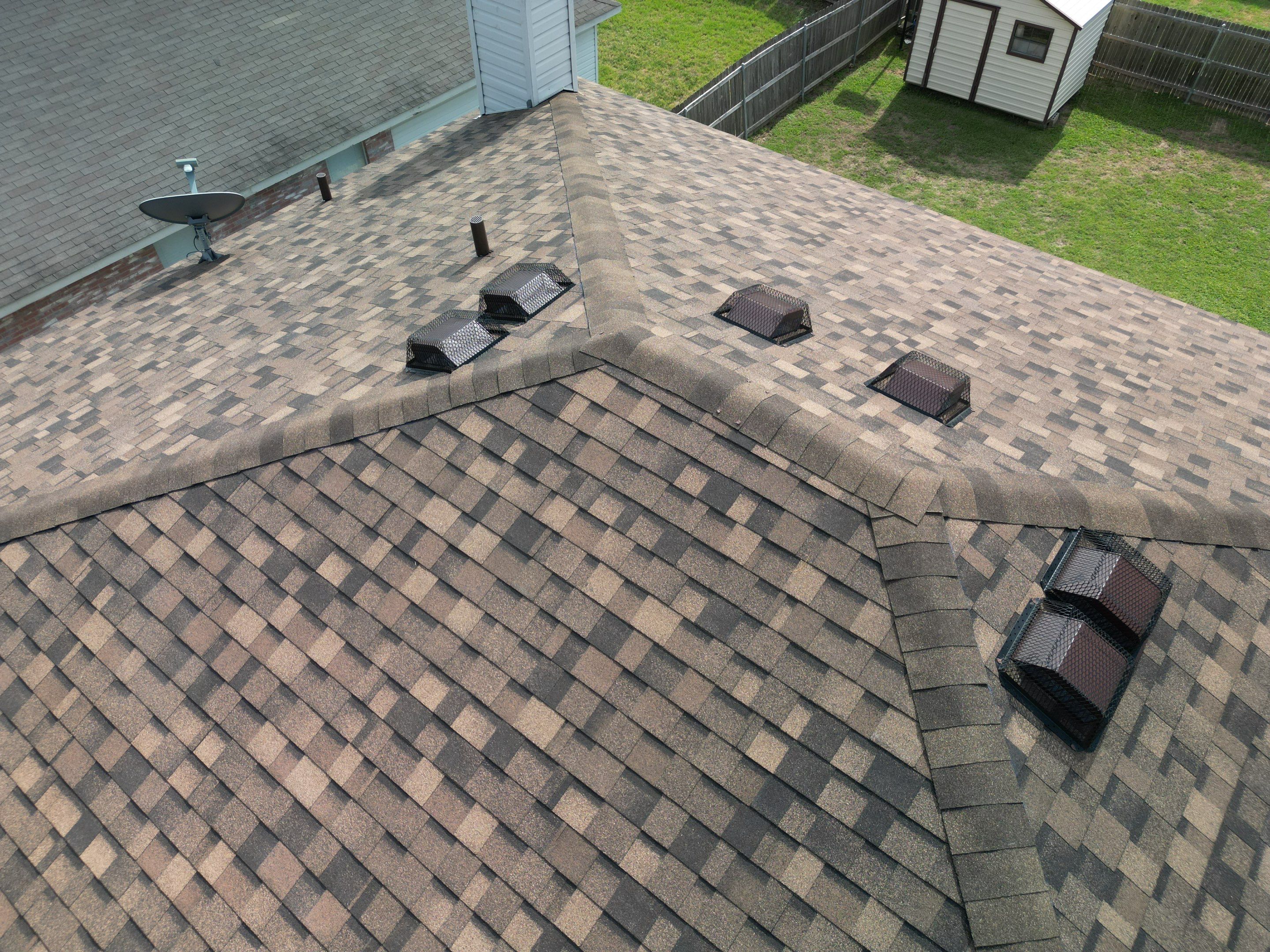 Full Roof Replacement, Chimney Rebuild and Interior Damage Replacement by First United Roofing & Construction