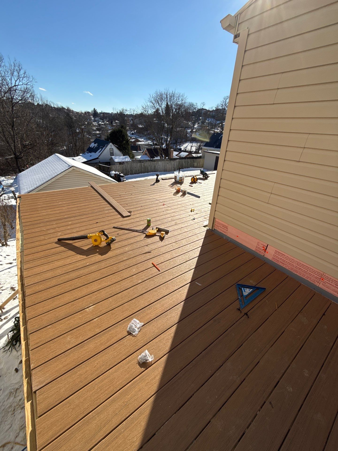 Deck and door by Cousins Roofing Siding & Decks