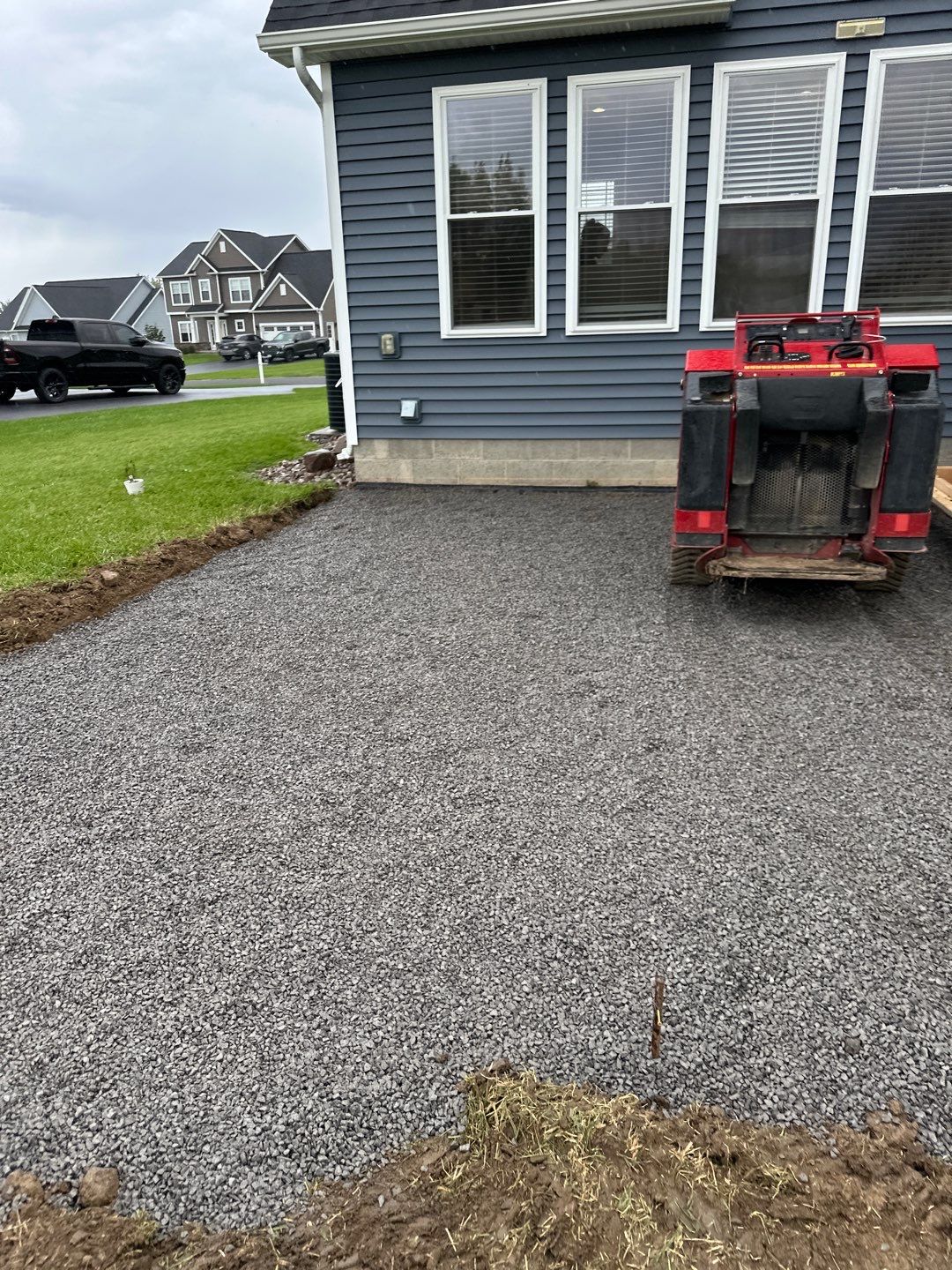 Majestic Ashlar stamped concrete patio with rock face steps  by NG Masonry & Construction LLC