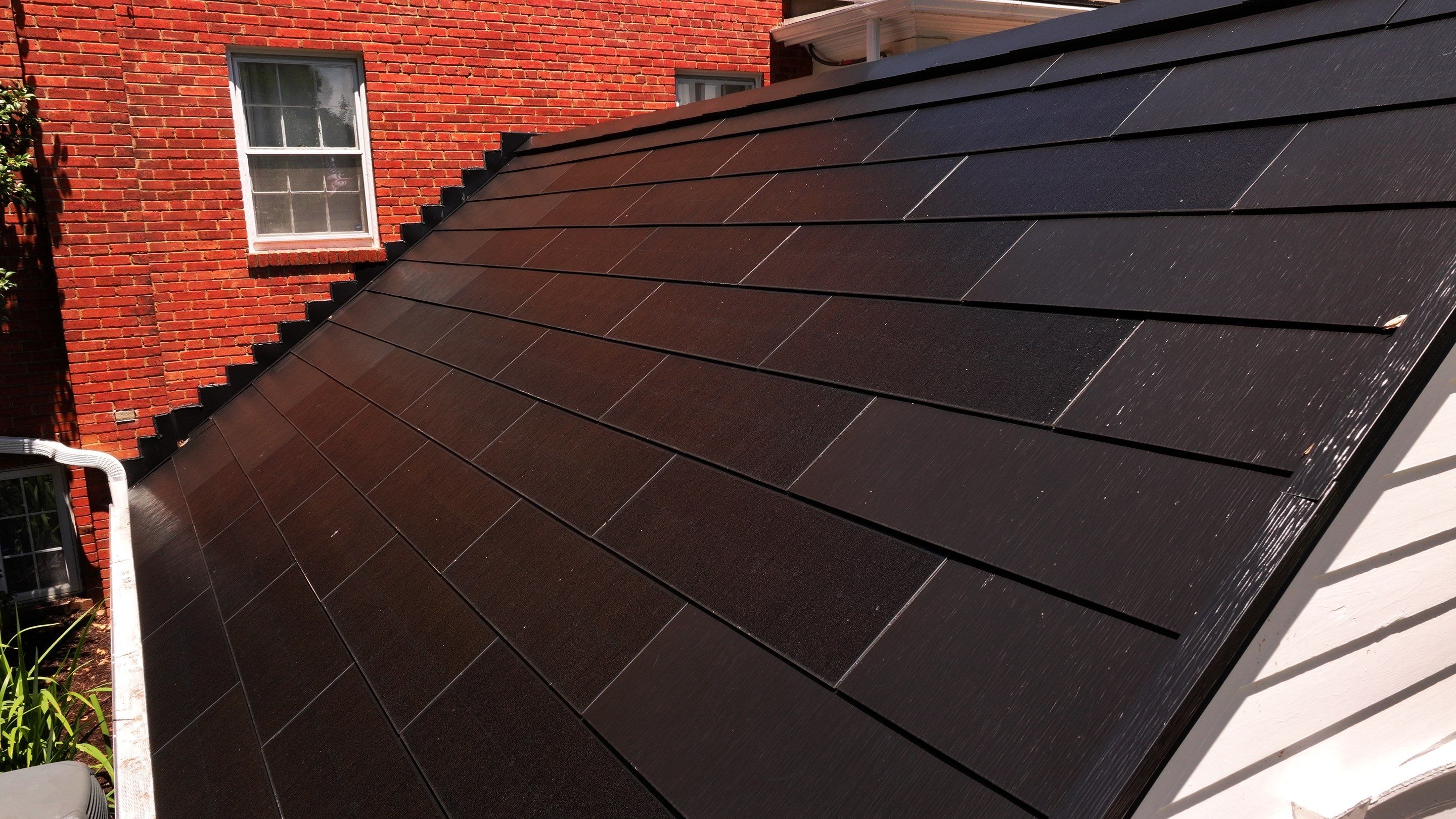 Sleek Tesla Solar Roof + Powerwall Installation | Alexandria, VA by American Home Contractors