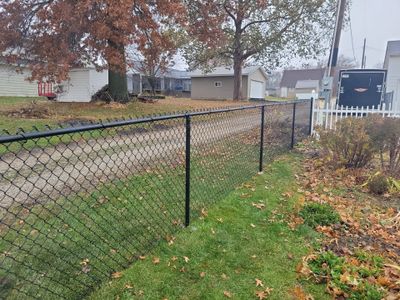 Black Vinyl-Coated Chain Link Fence Installation in Aplington