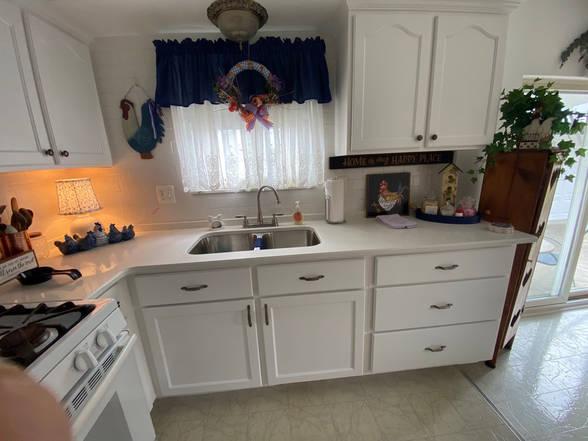 White Shaker Cabinet Refinishing and Painting in Sterling Heights by Top Shelf Painter