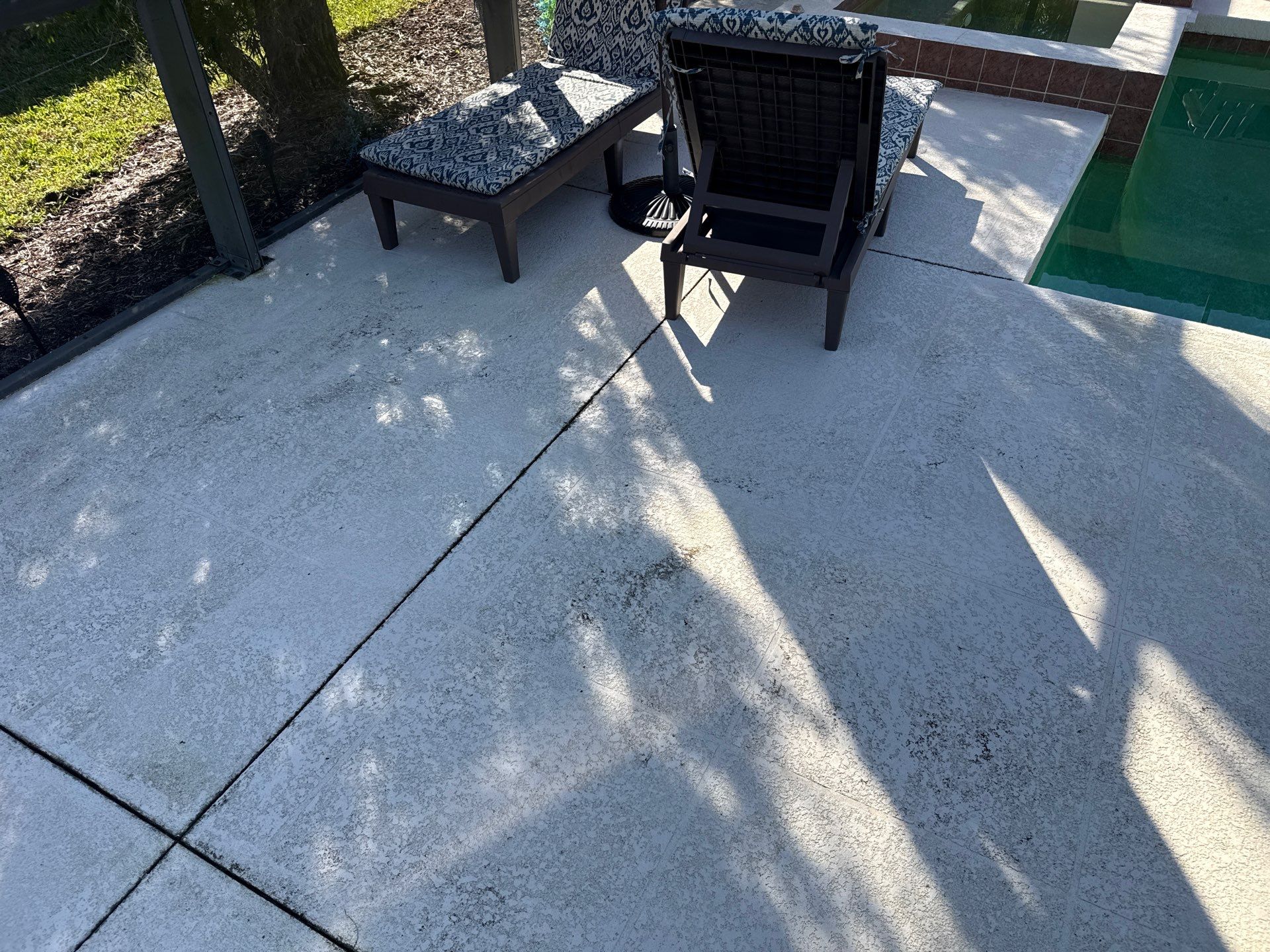 Painted Pool Deck, Lanai & Pool Cage Cleaning in River Club South – Bradenton, FL by Sunshine AquaWash