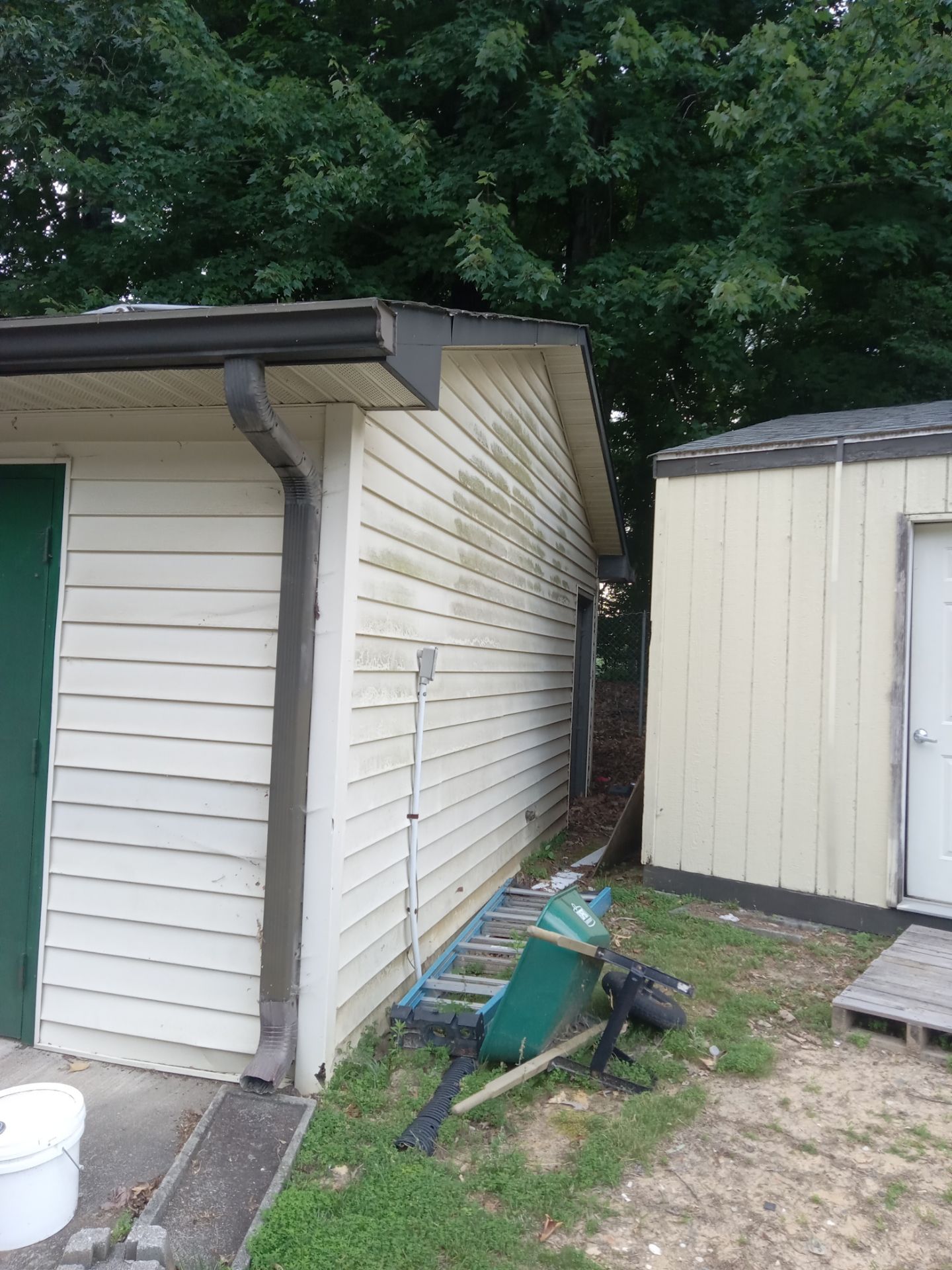 pressure washing exterior siding and possibly the concrete walkway to remove dirt buildup grime and mildew