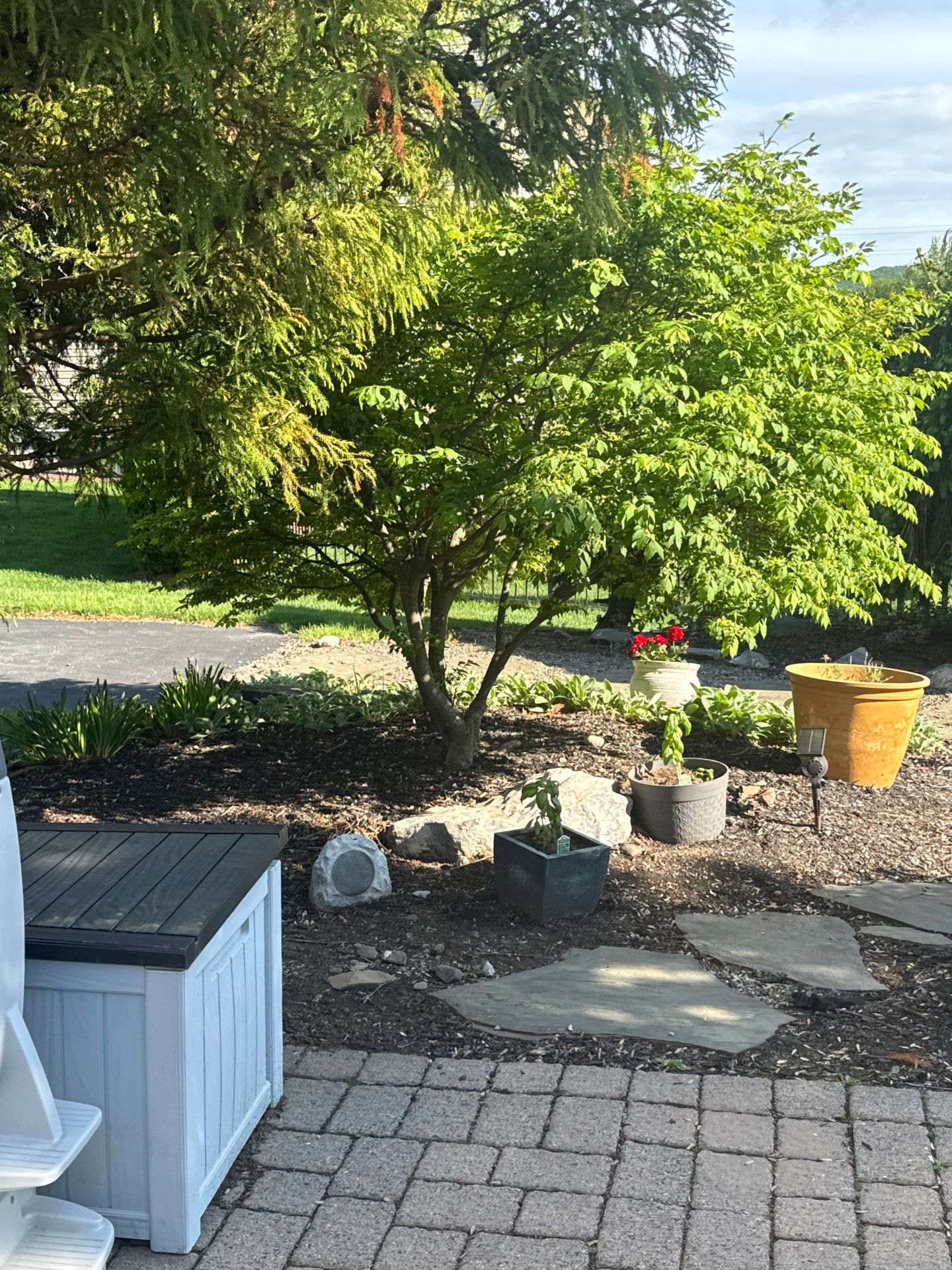 Backyard Retreat: Techo-Bloc Patio + Firepit Lounge by Saylor’s Lawn & Landscape