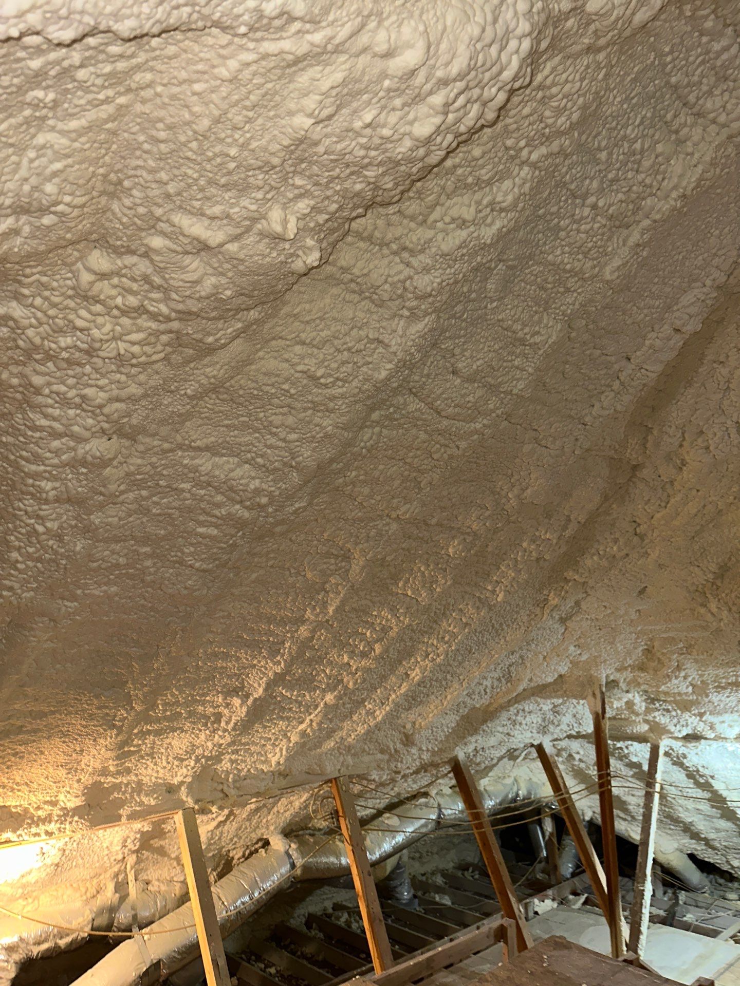 Spray foam insulation removal & re spray by Apex Insulation Solutions