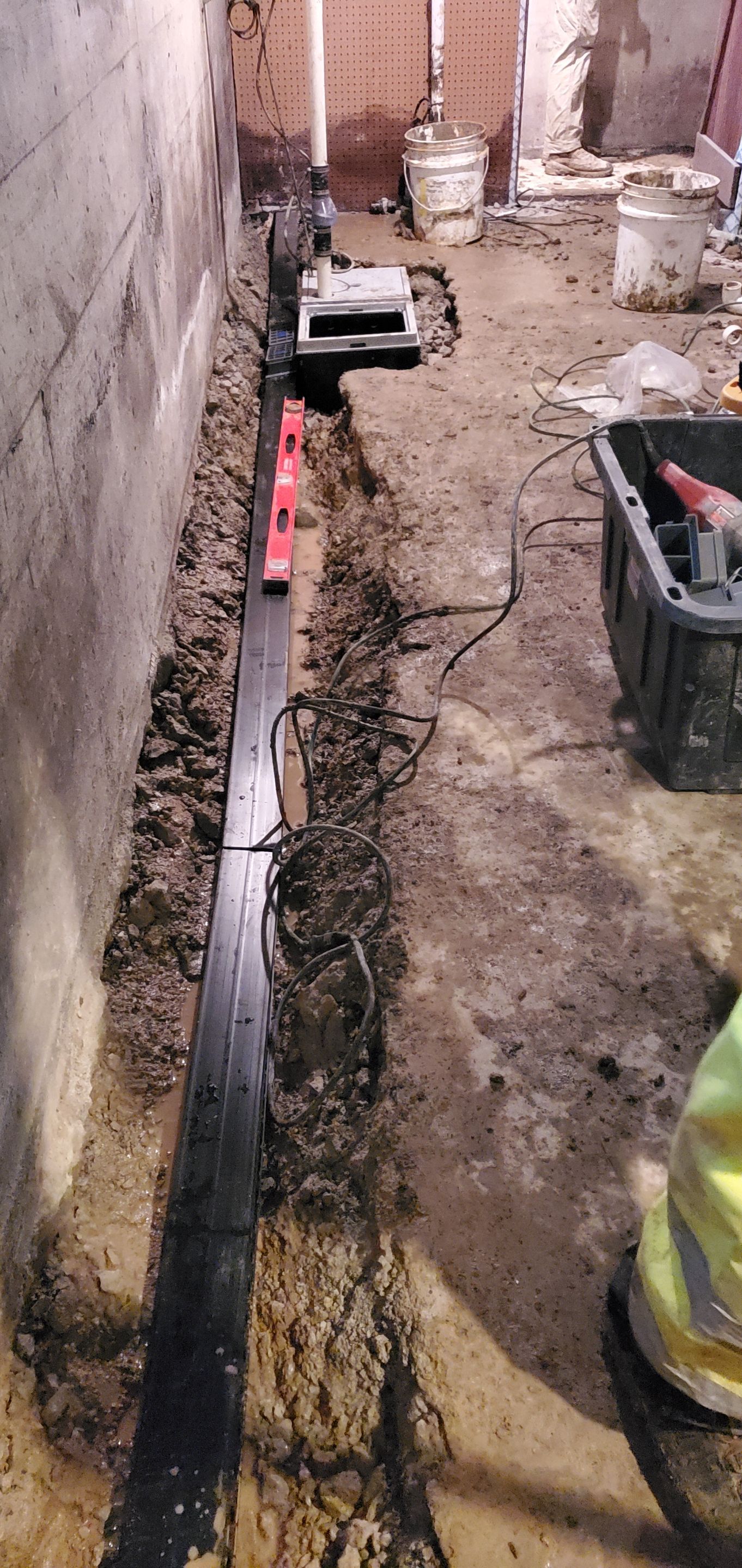 Interior Basement Waterproofing System using GrateDrain Waterproofing System by Toledo Basement Repair 