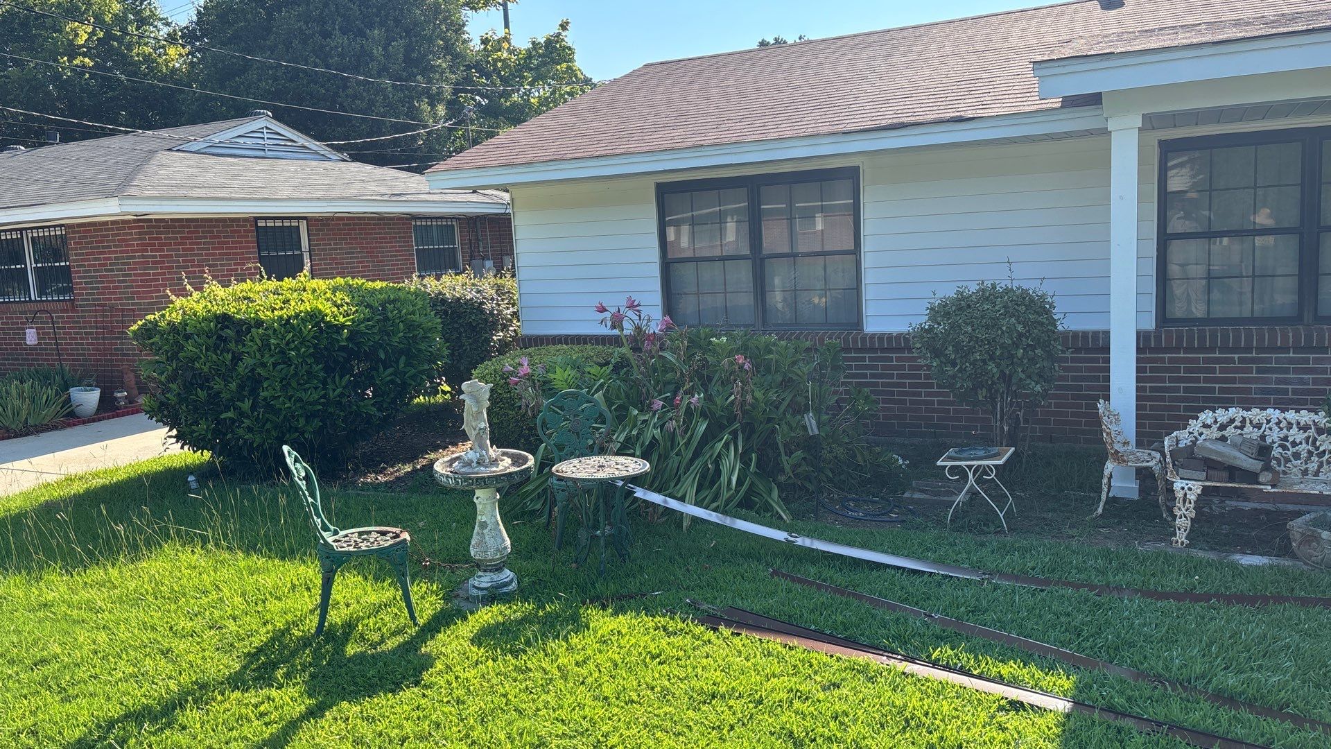 Front Yard Landscape Cleanup and Gravel Bed Installation in Montgomery by BTops Landscaping Inc.