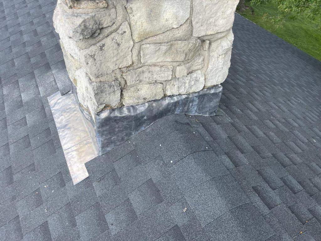 Storm damage roof replacement by Nitro Roofing and Construction