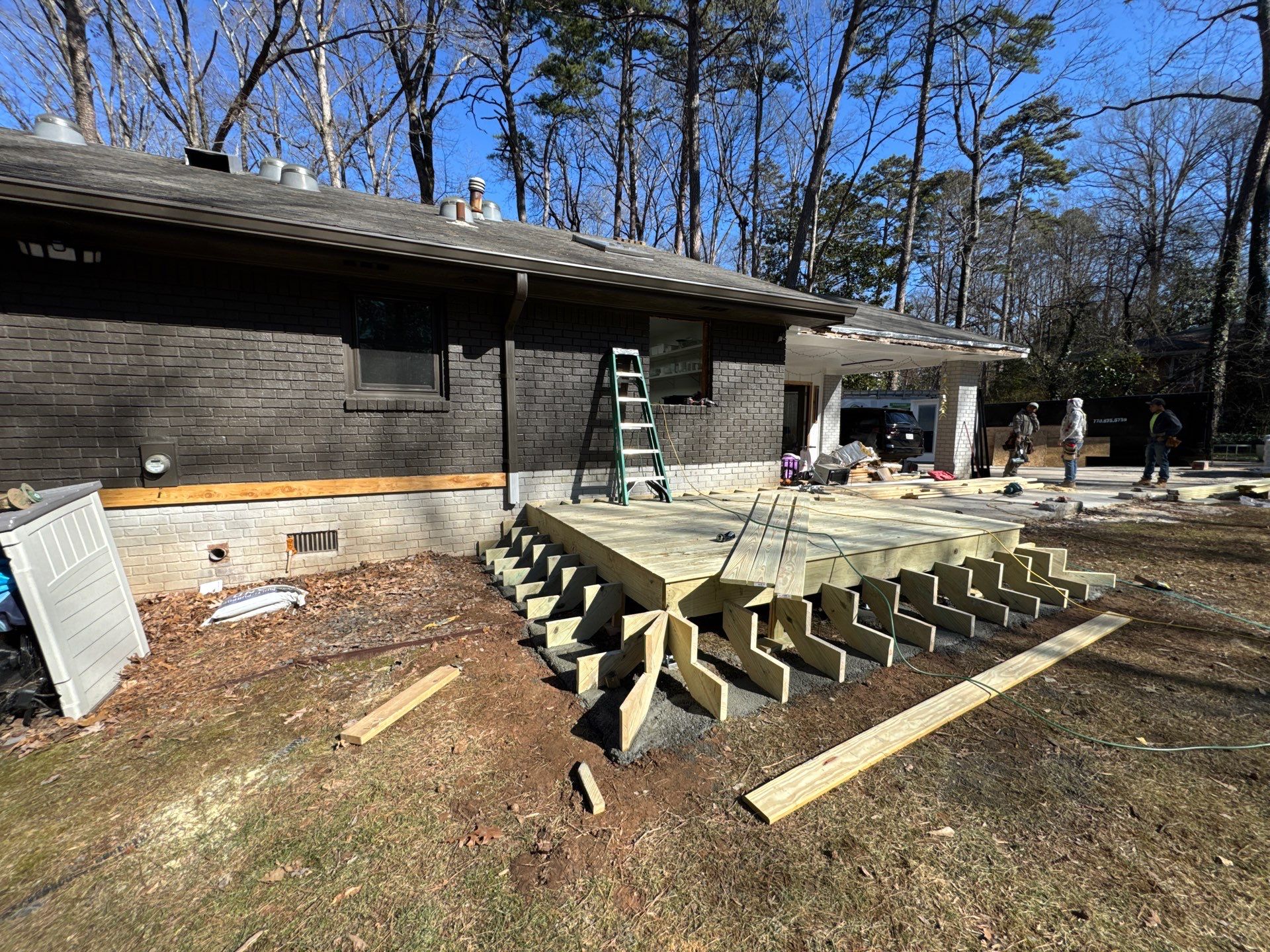 Modern Exterior Transformation and Multi-Tiered Deck Installation in Decatur by Swift Home Renovations