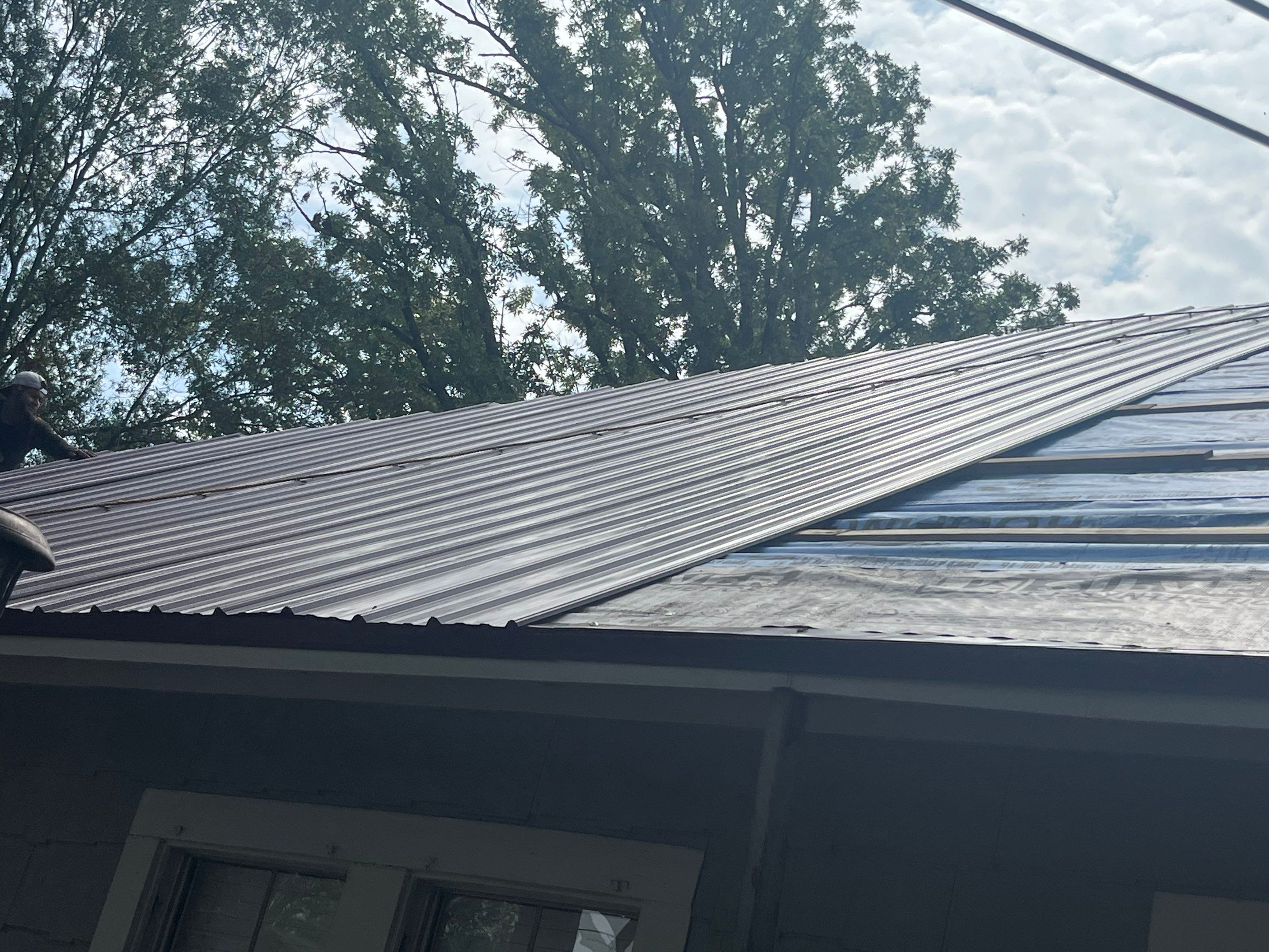 Residential Metal Roof Replacement using Reed's Metals: Colored Residental Panel (Burgundy) by Hostetler Roofing