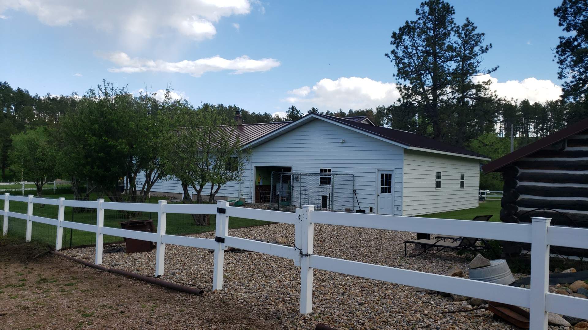 Ribbed Steel Roof Farmhouse Style by Weather-Tite Exteriors LLC