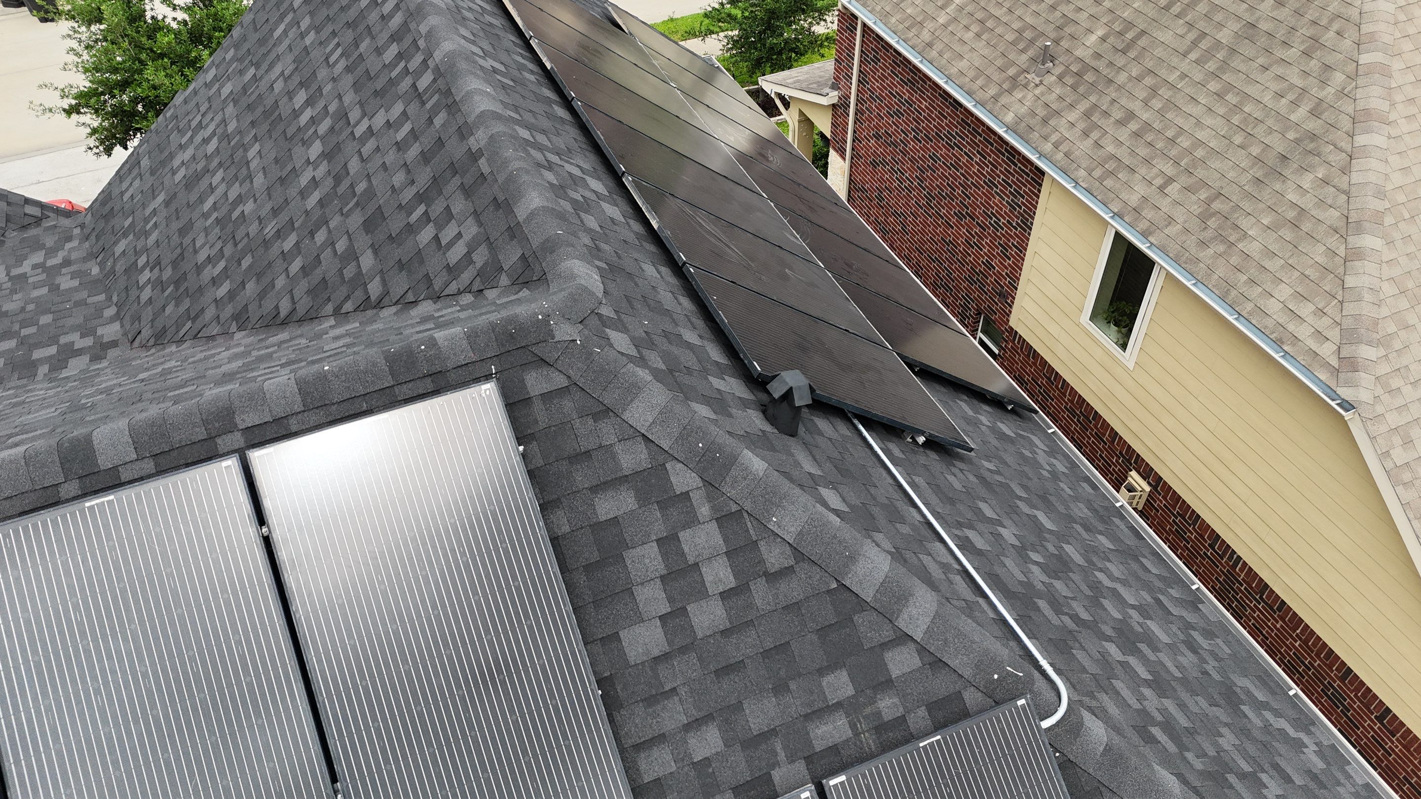 Residential Roofing Installation using IKO Dynasty by Core Four Roofing