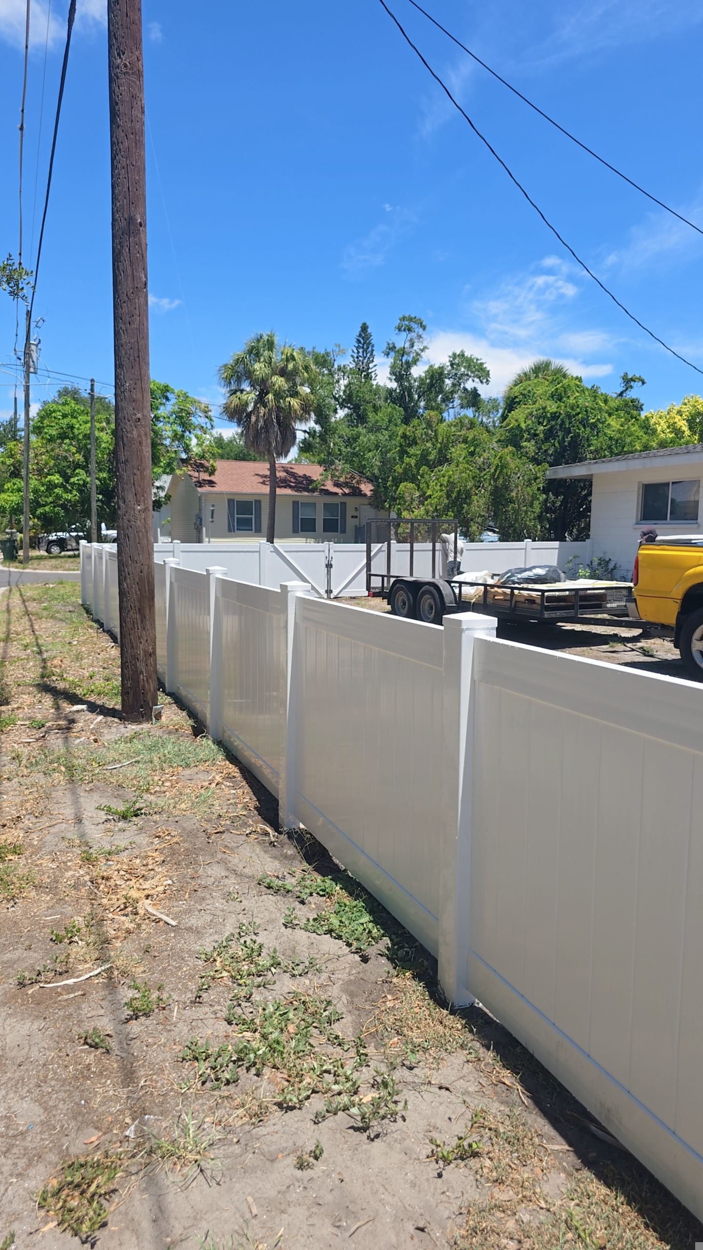 White Vinyl Privacy Fence and Gate Installation in Bradenton by True Fence LLC