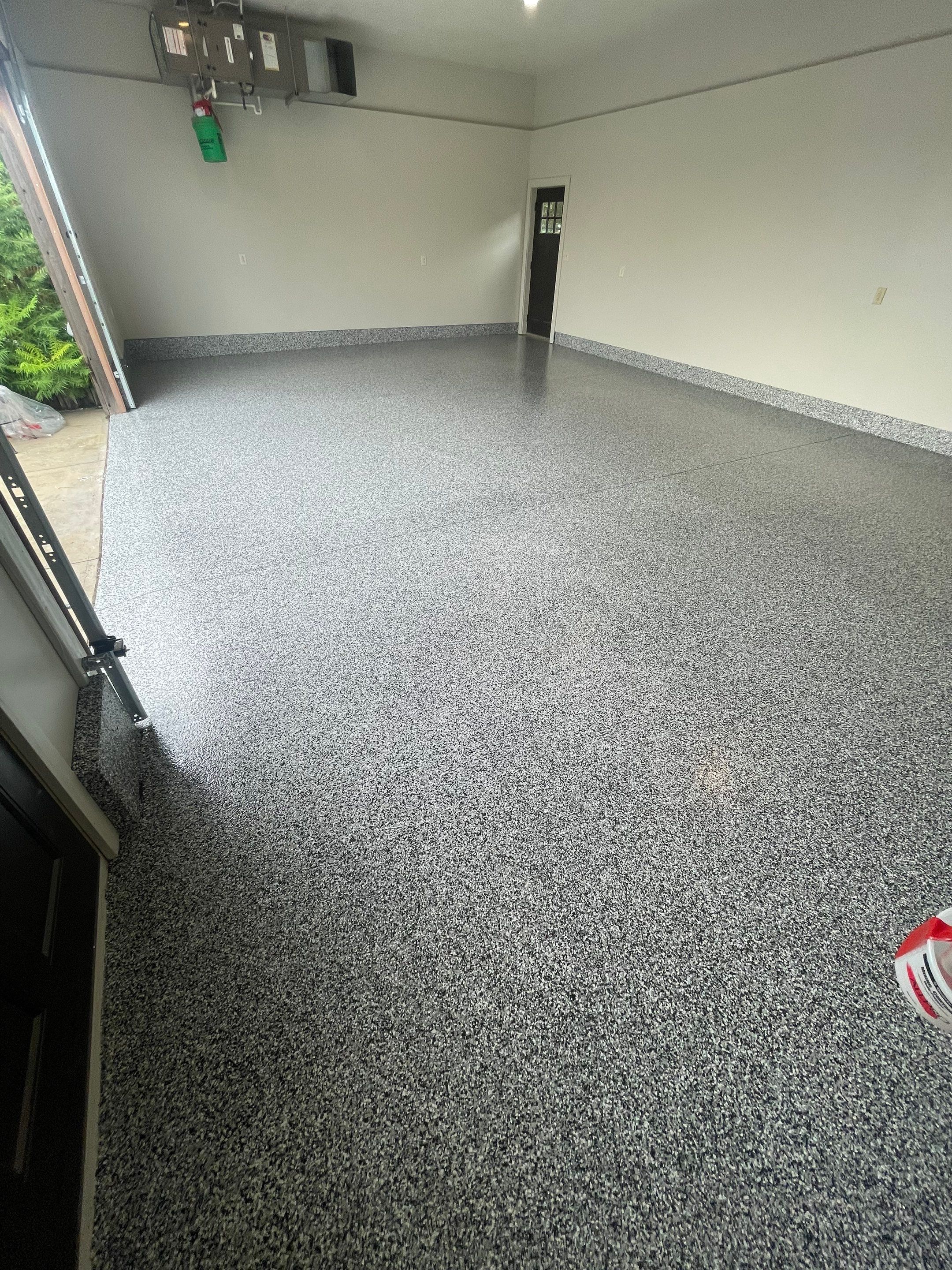 Domino Flake Floor Coating and Crack Repair in Chancellor by Select Painting, Coatings & Garage Cabinets