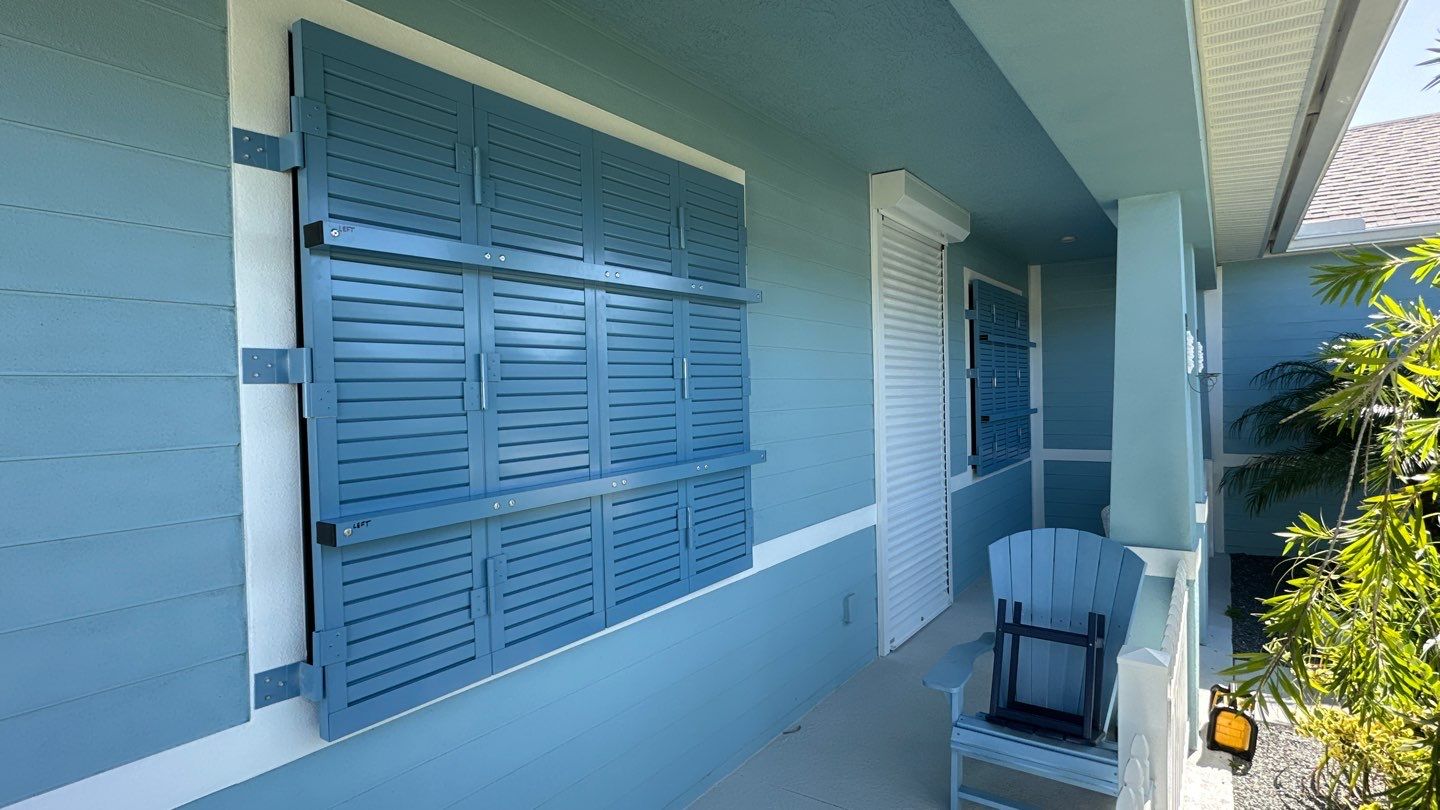 Hurricane Rated Shutters in Pastel Blue by Smart Guard Shutters