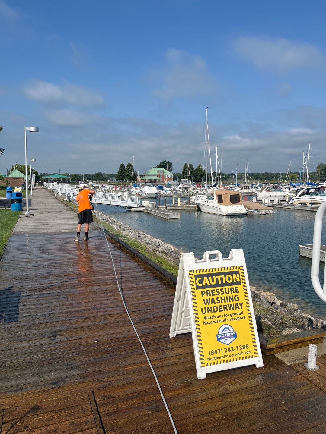 wood promenade cleaning by Northern Power Washing LLC.