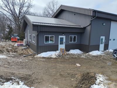 6-Inch Seamless Gutter and Snow Guard System for Rockford Commercial Building