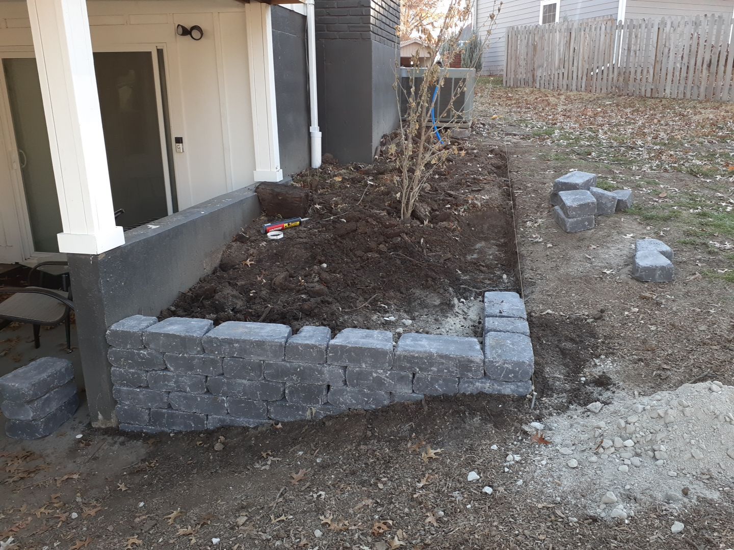 Entire Home Landscape and Retaining Walls by LAND ESCAPES LLC