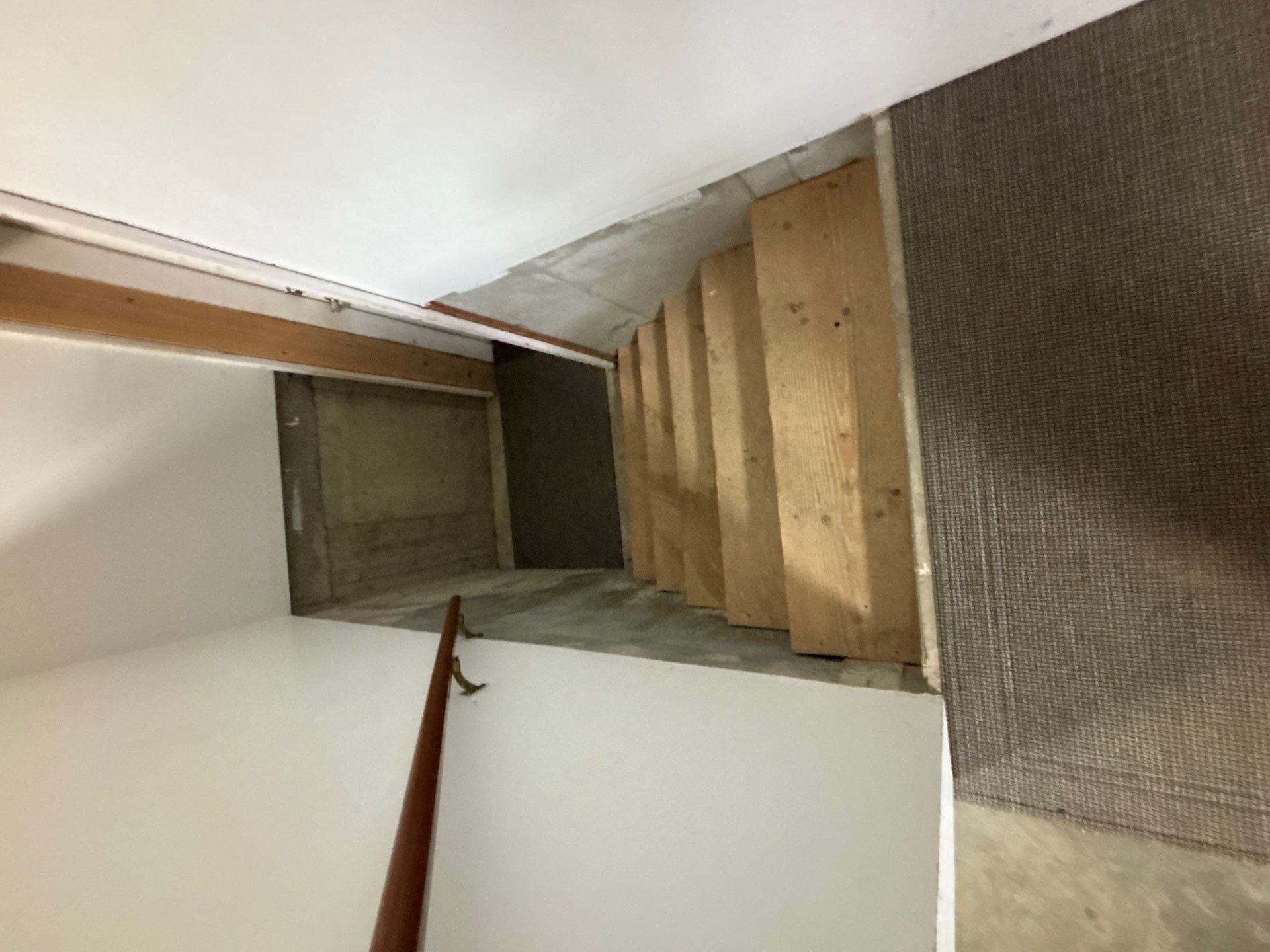 Full Garage Floor and Basement Stair Epoxy Coating in Sioux Falls by Select Painting, Coatings & Garage Cabinets
