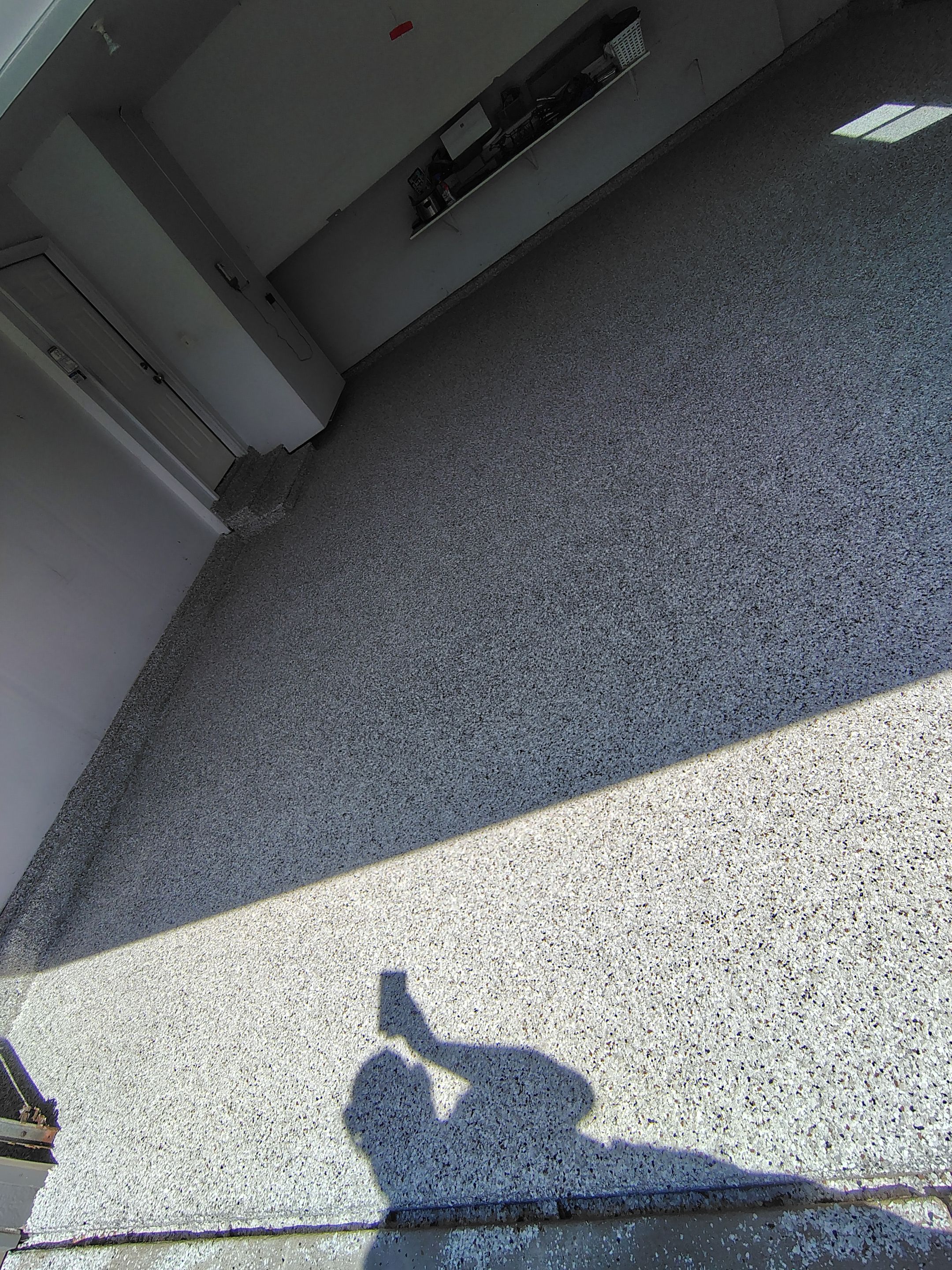Decorative Chip Epoxy Garage Floor Coating in Sioux Falls by Select Painting, Coatings & Garage Cabinets