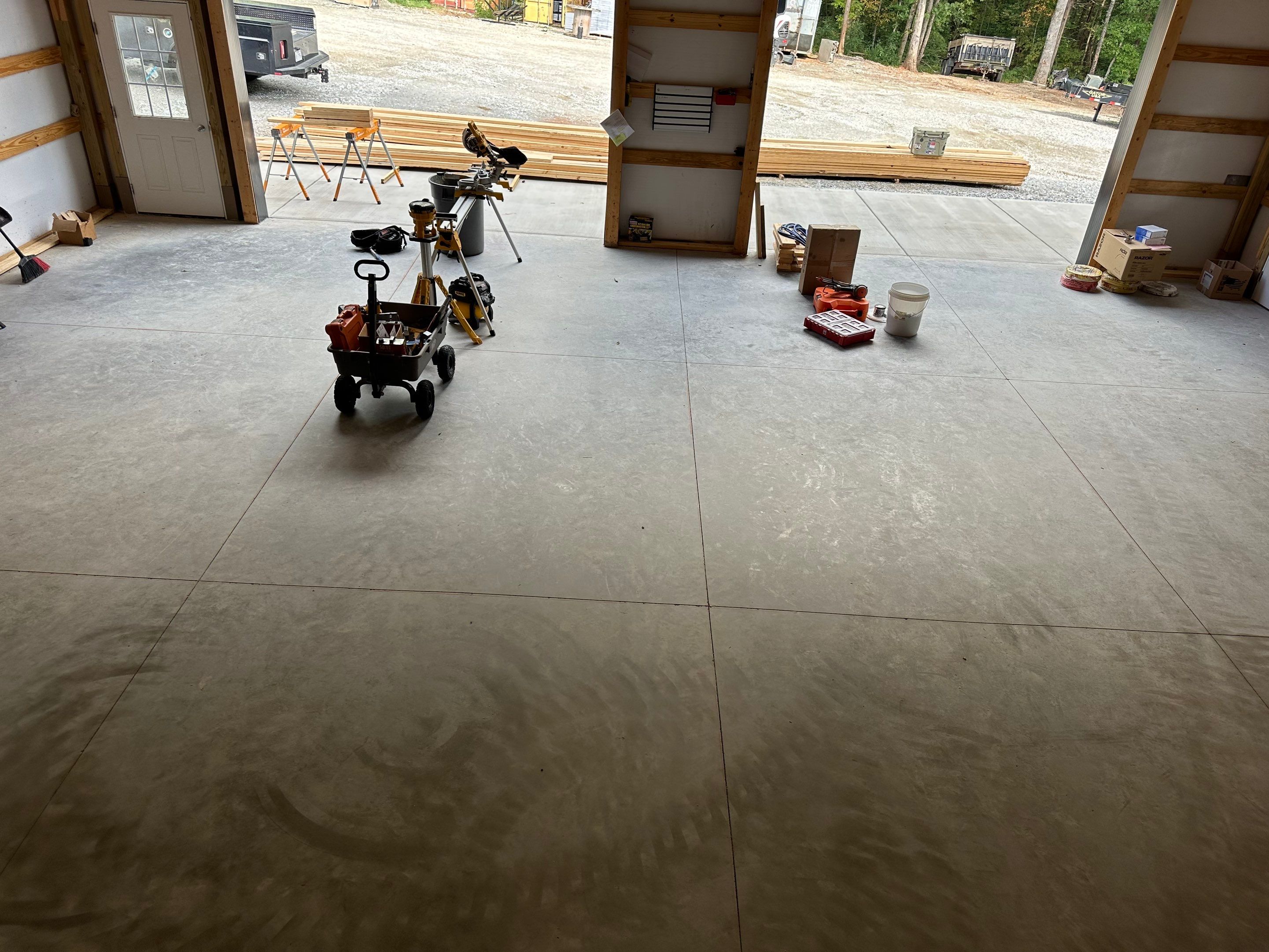 Custom Flake Floor and Company Logo by Endure Concrete Coatings