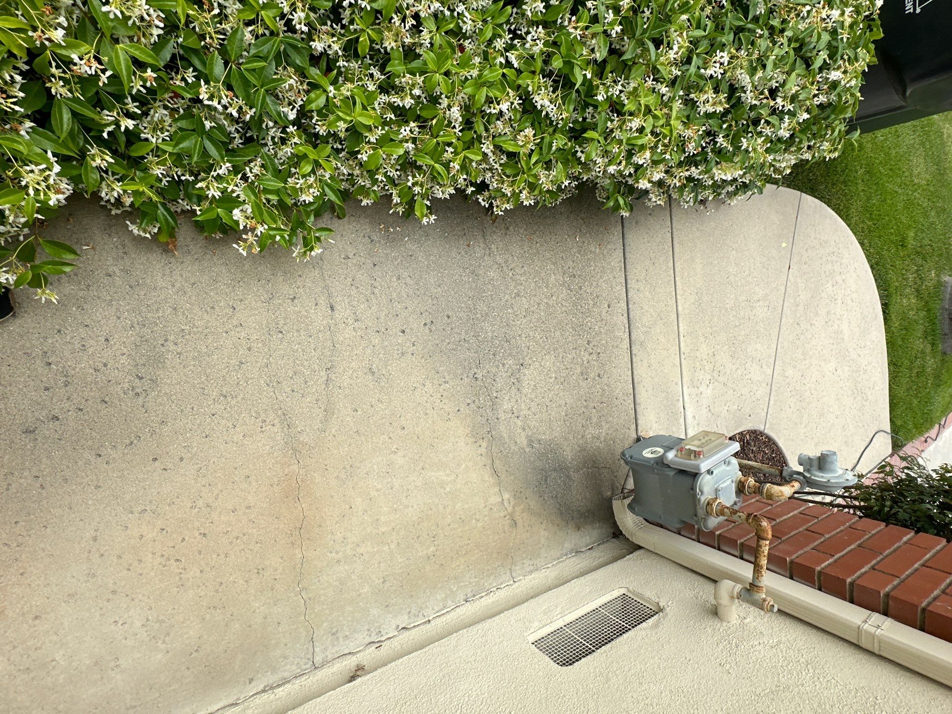 Surface cleaning pressure washing in Orange County on patio, walkways, and driveway by Property Cleaning Experts, LLC