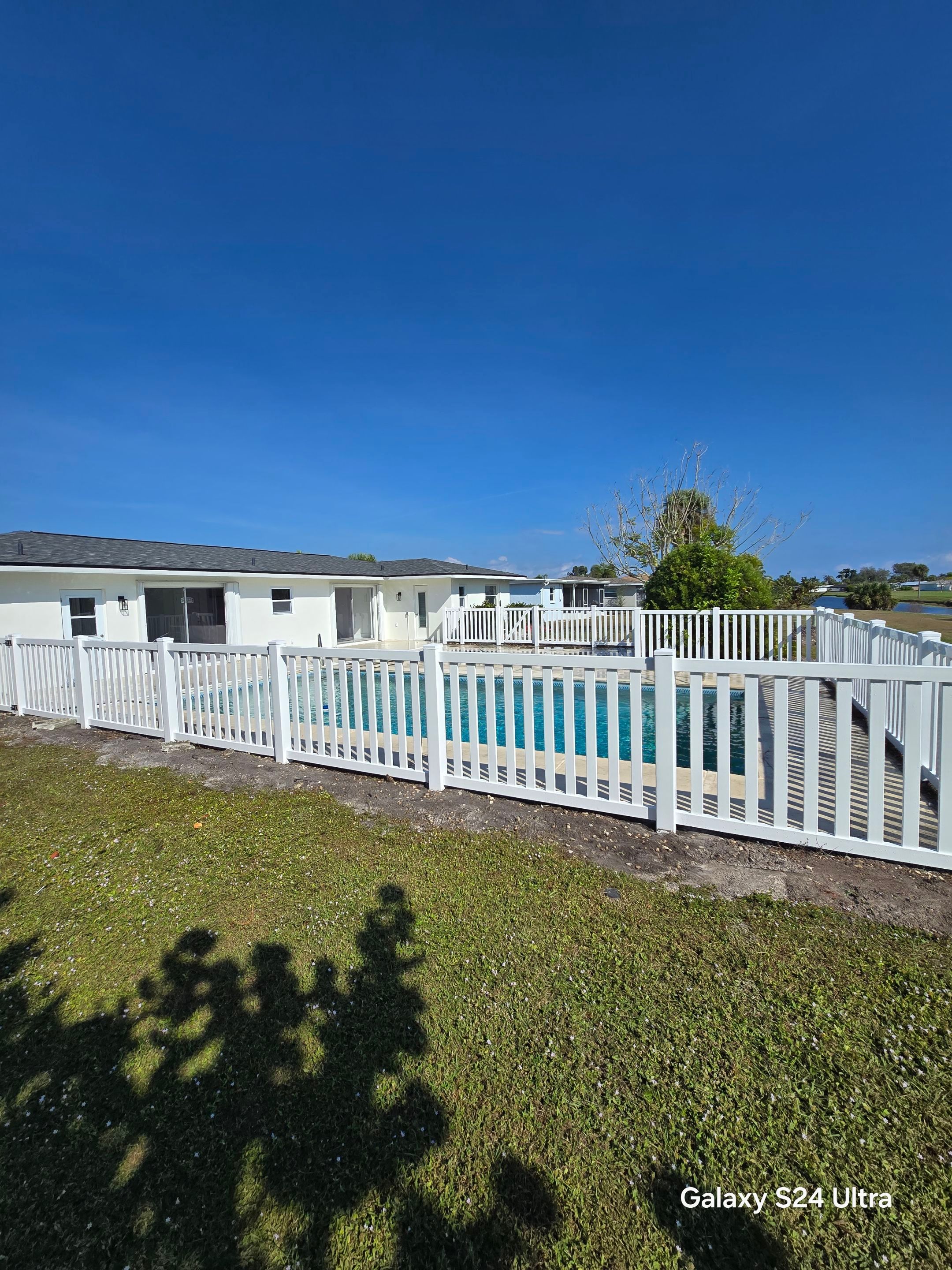 Vinyl Picket Fence for Pool in Port Charlotte by True Fence LLC