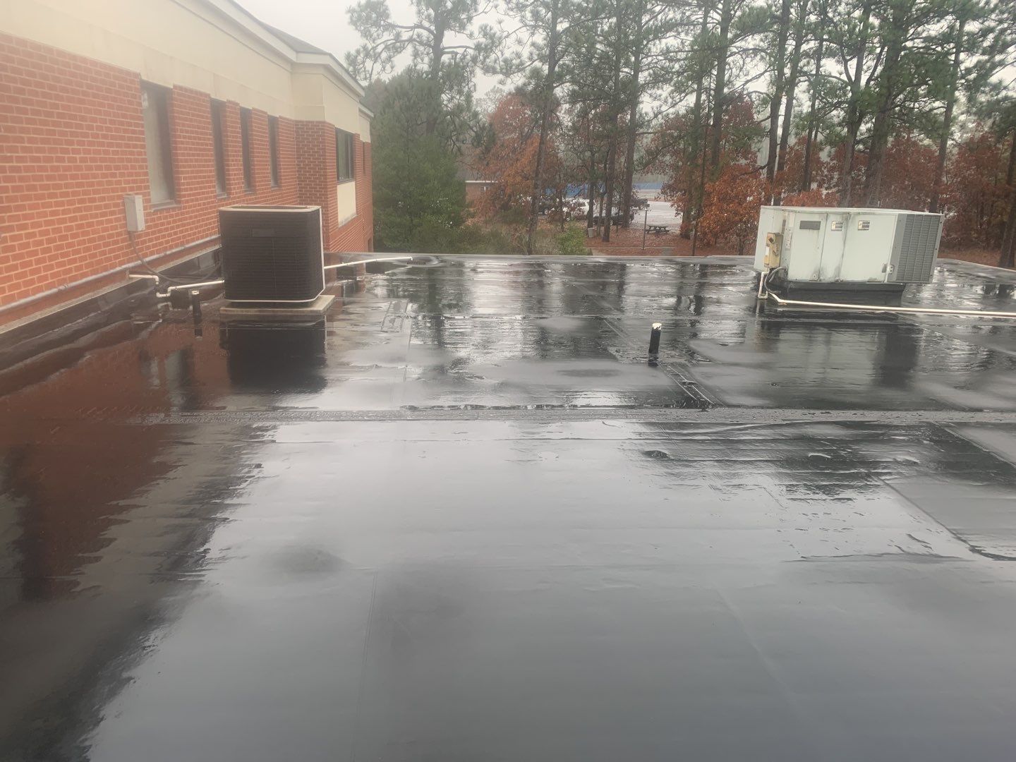 Re Roof (TPO) by American Roofing NC