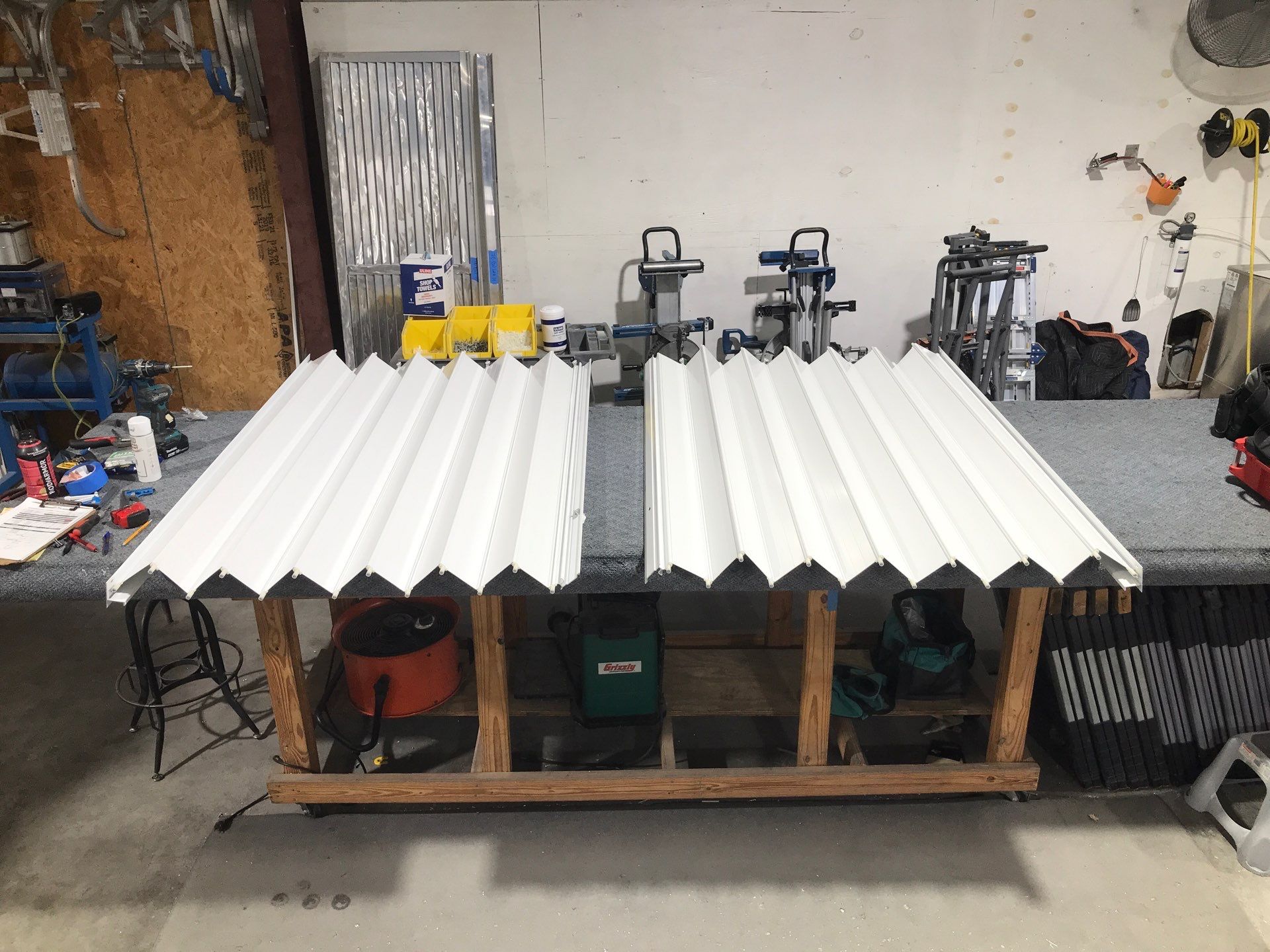 Residential Accordion Hurricane Shutter Installation in Fountain, Florida by Brannan Aluminum Inc.