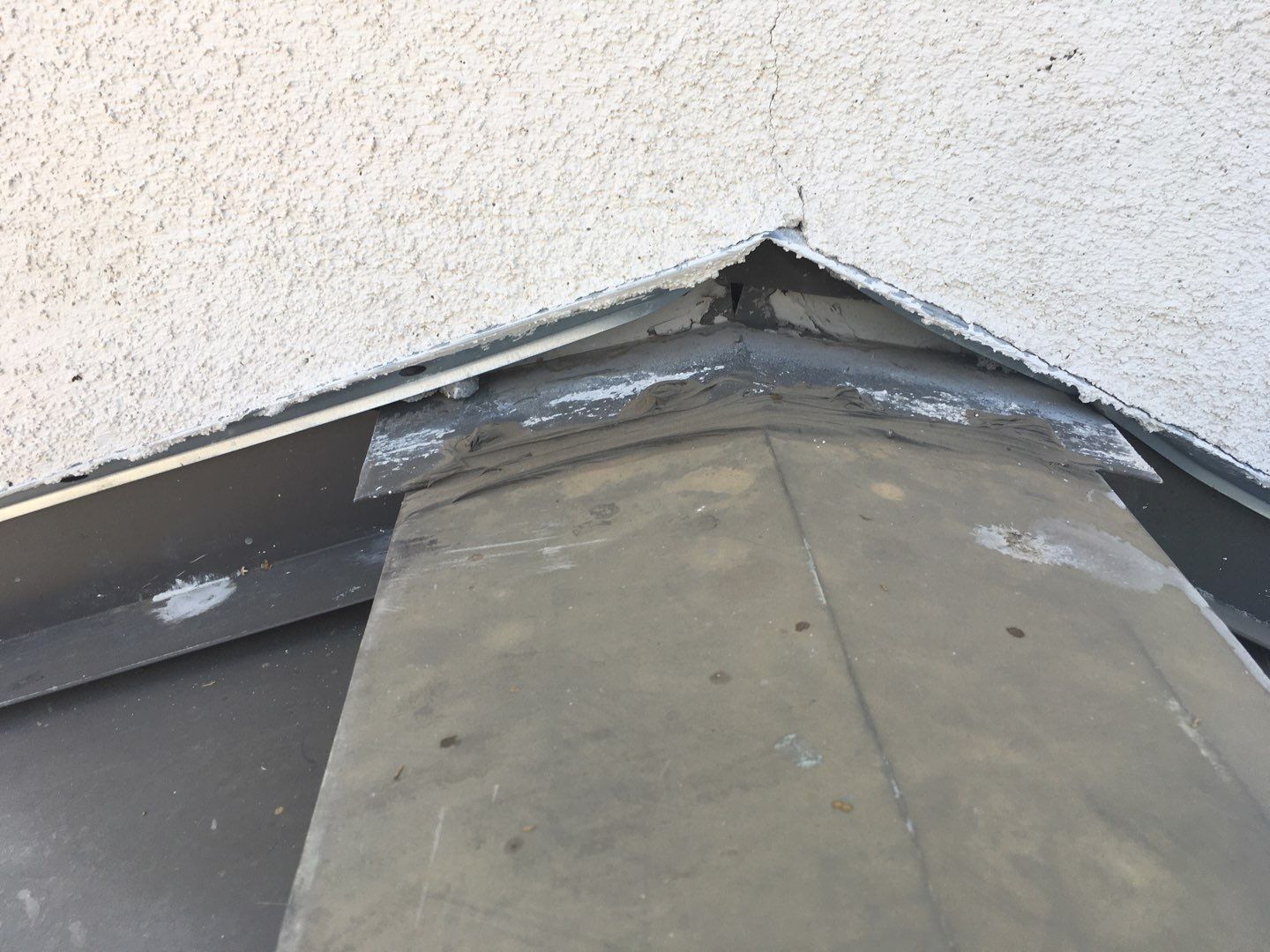Spray foam and coatings inside commercial building HVAC well using Spray foam and coatings over existing BUR system by Straight Edge Roofing Inc
