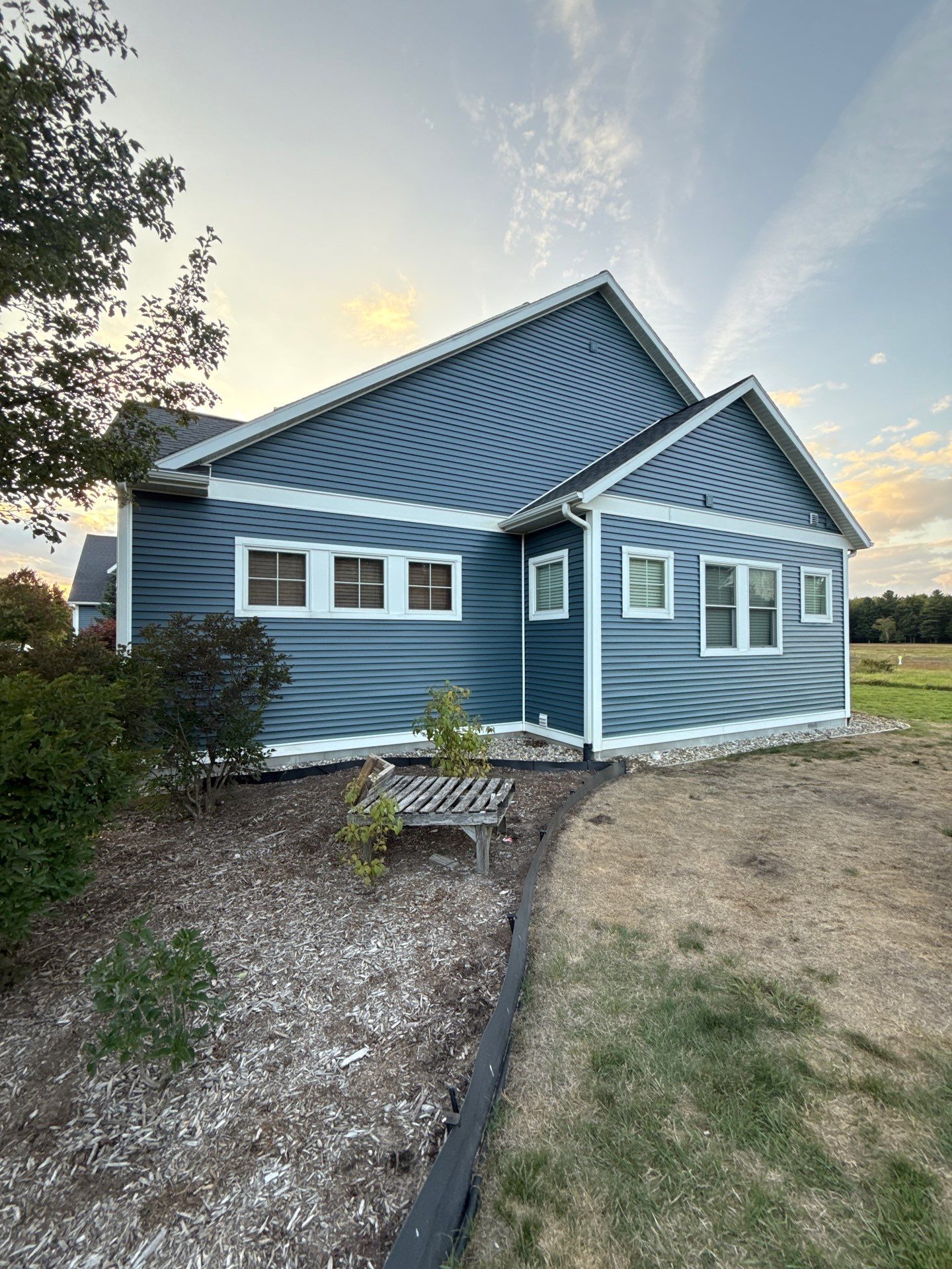 Complete Exterior Refresh with Painted Home & Stained Deck by Gordon Painting