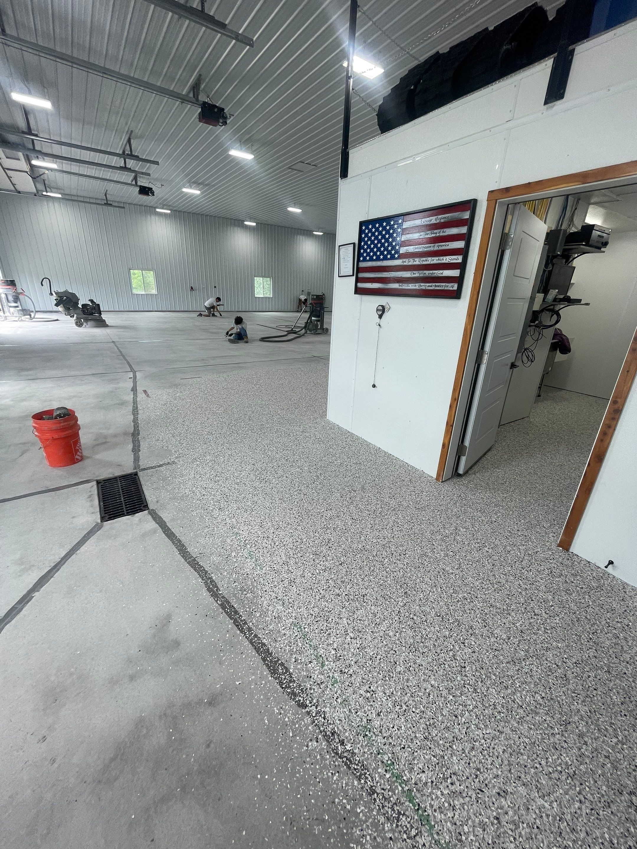 Multi-Stage Concrete Floor Coating for Egan Shop and RV Storage by Select Painting, Coatings & Garage Cabinets
