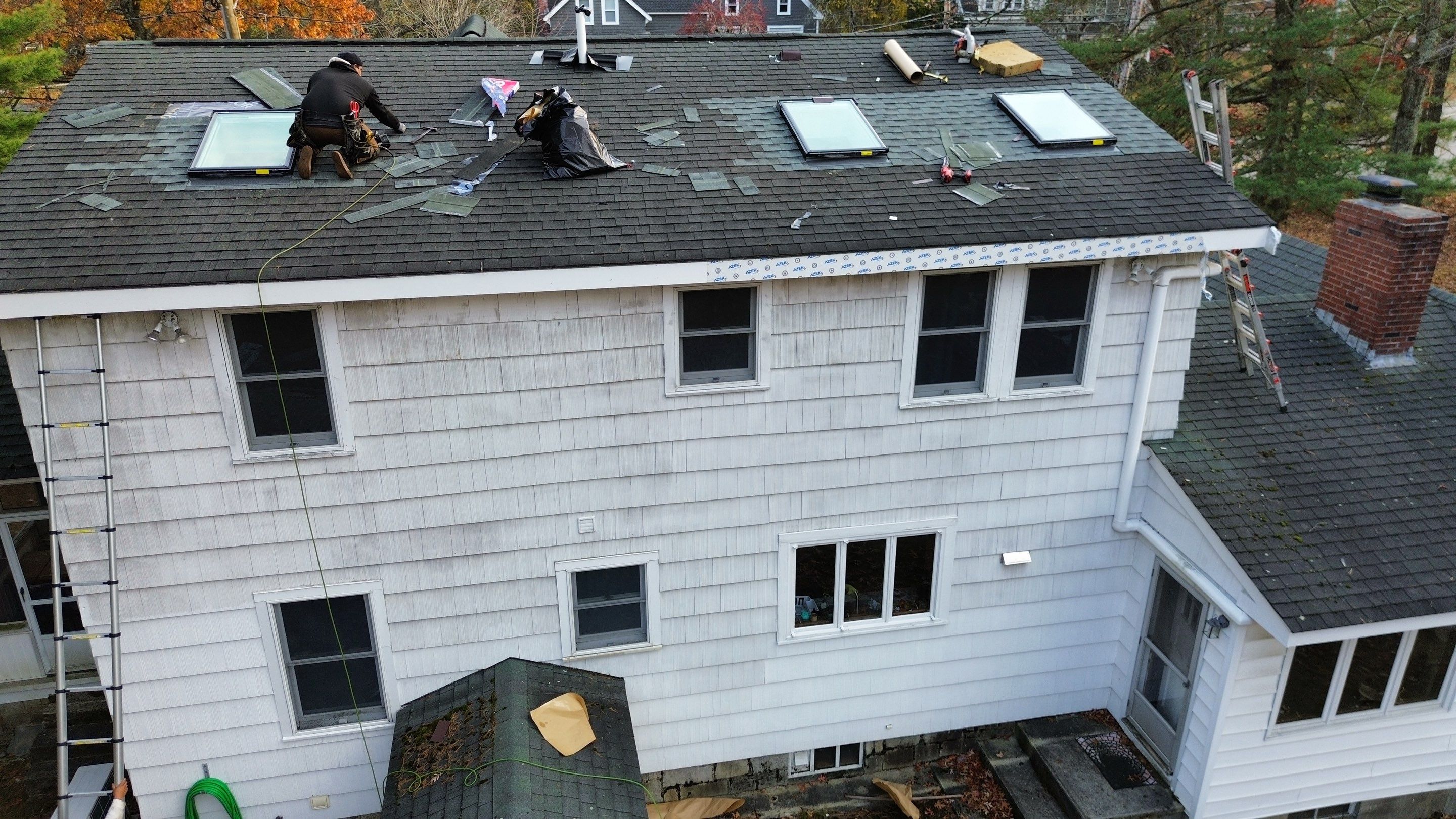 Chelmsford Triple Skylight Leak Repair with Fascia & Shingle Restoration by Mighty Dog Roofing of Greater Middlesex County