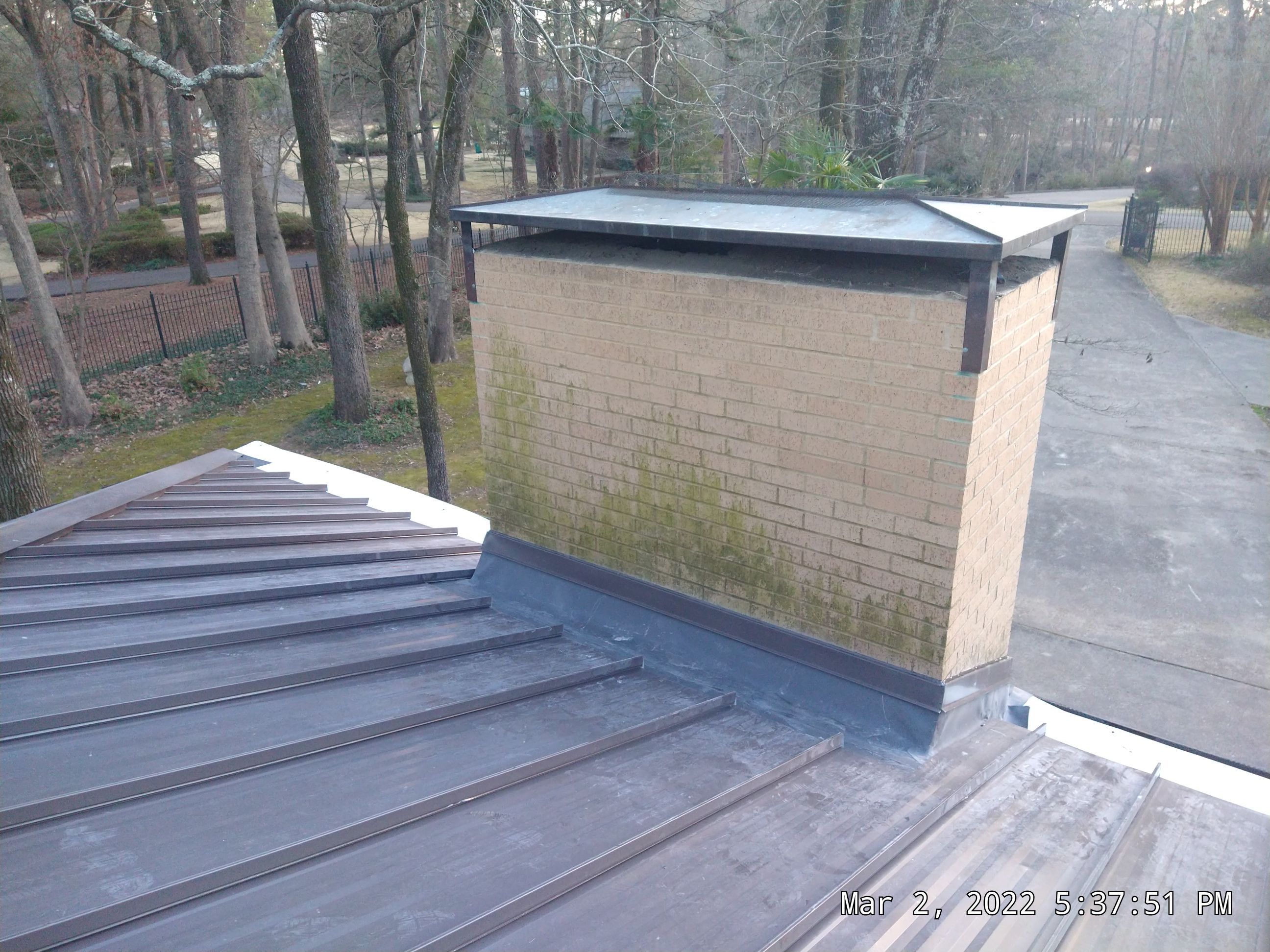 Residential Roofing Installation using PVC membrane and 24 gauge Standing Seam Metal by Hostetler Roofing