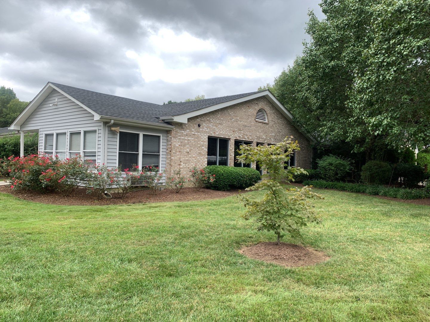 Re Roof  by American Roofing NC