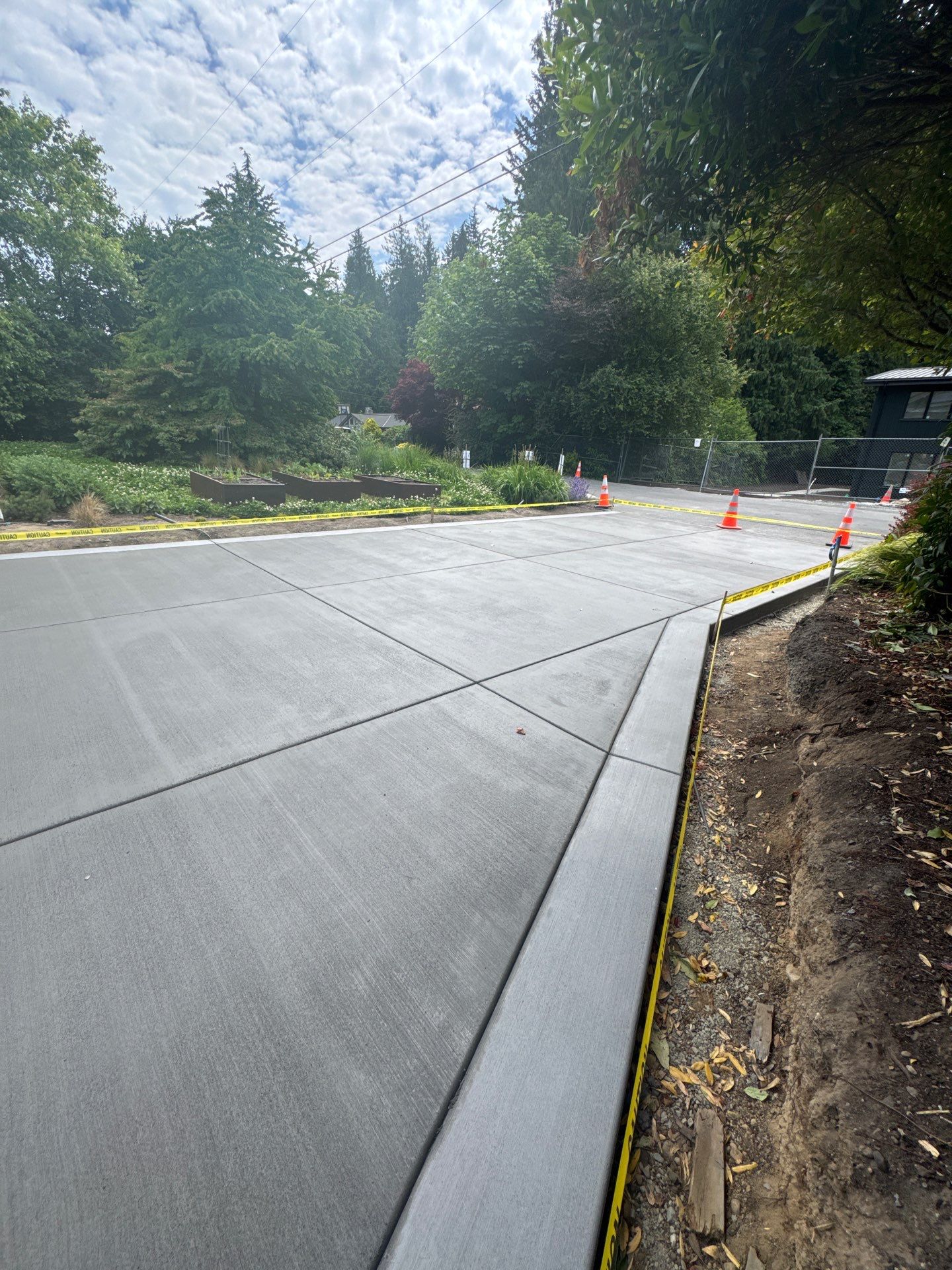 Concrete Driveway Makeover | Edmonds  by Jireh Asphalt & Concrete Inc 