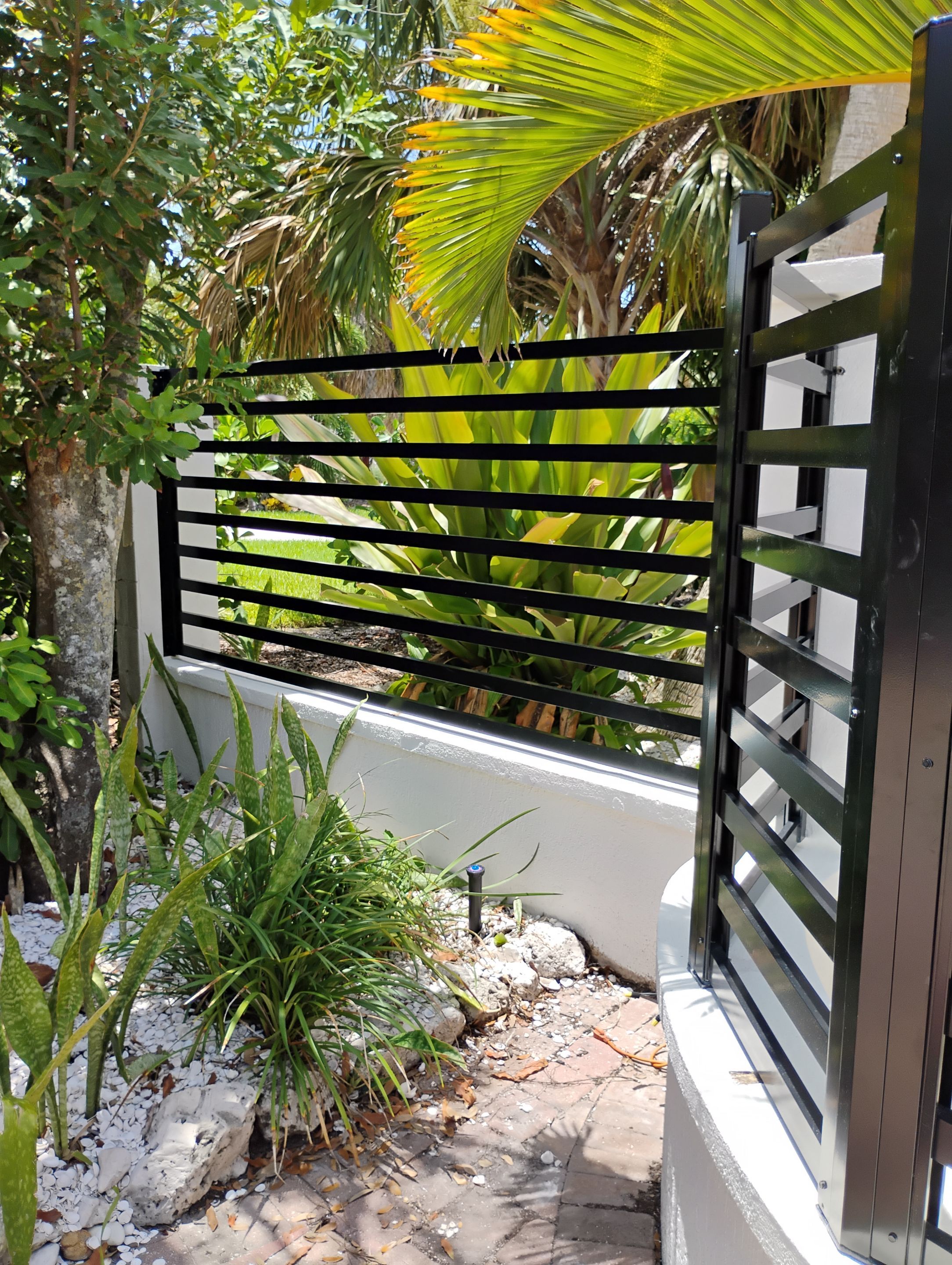 Custom Aluminum Horizontal Slat Fencing and Decorative Gates in Siesta Key by True Fence LLC