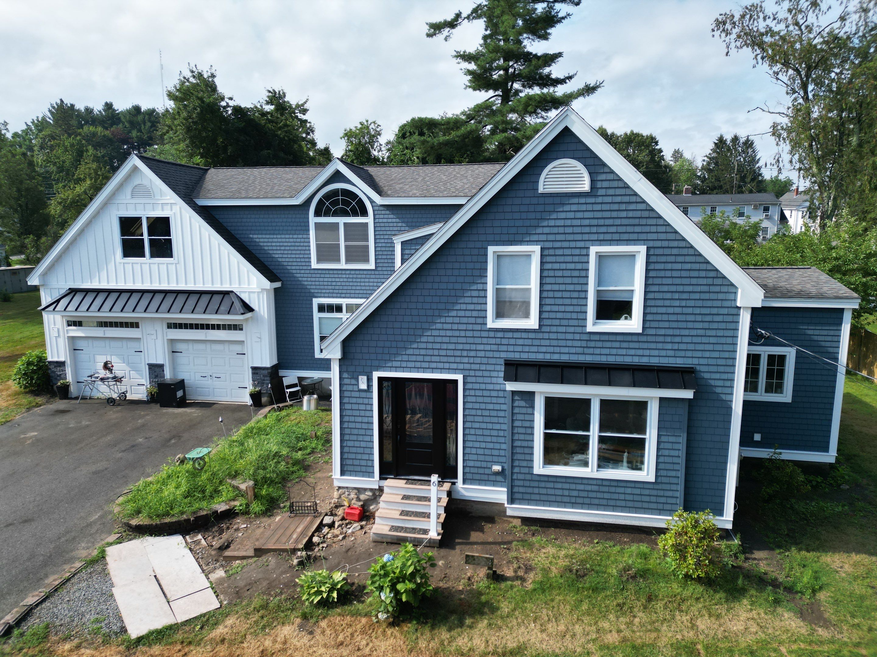 Premium Mixed-Material Siding Installation in North Billerica, MA by Mighty Dog Roofing of Greater Middlesex County
