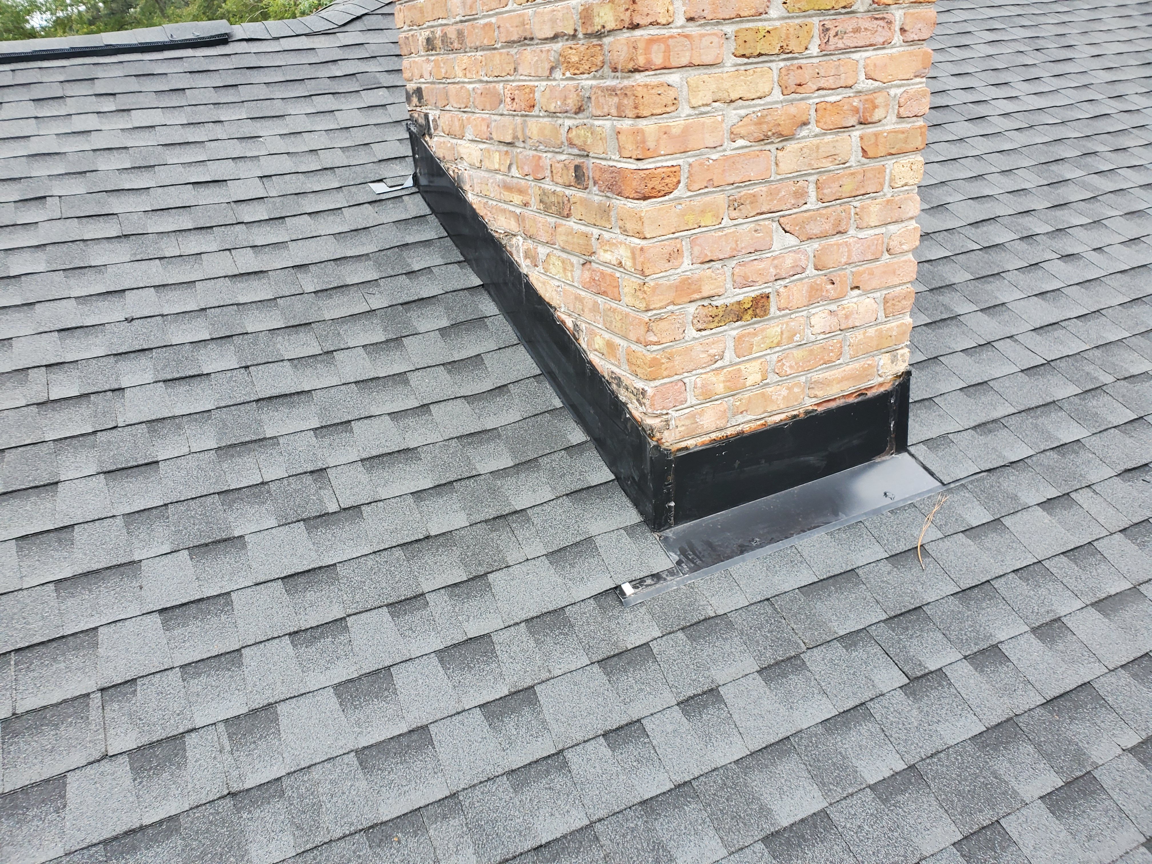 Residential Roofing Installation using Roof Replacement by American Roofing & Construction LLC
