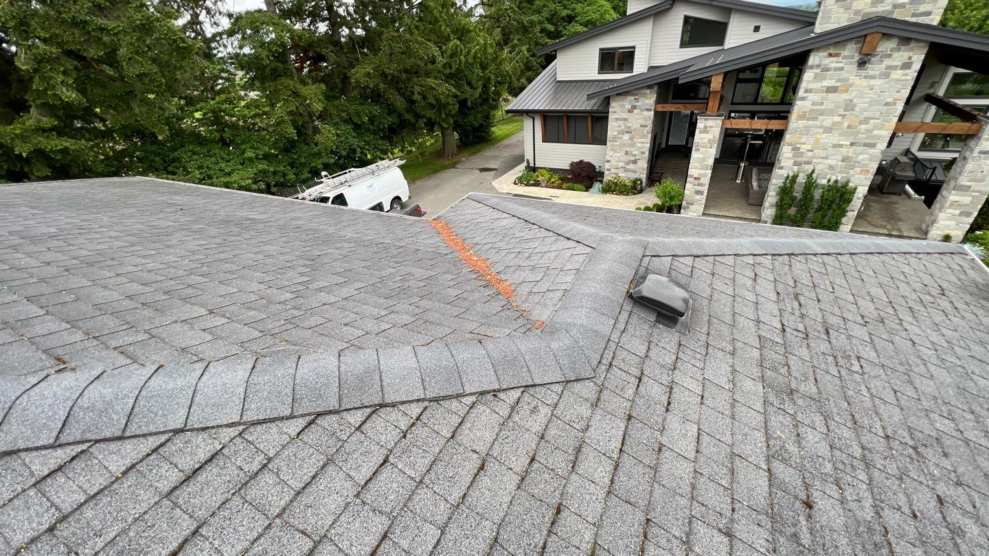 Residential Roofing Installation using 12" Prolok metal  by Top Notch Roofing Inc