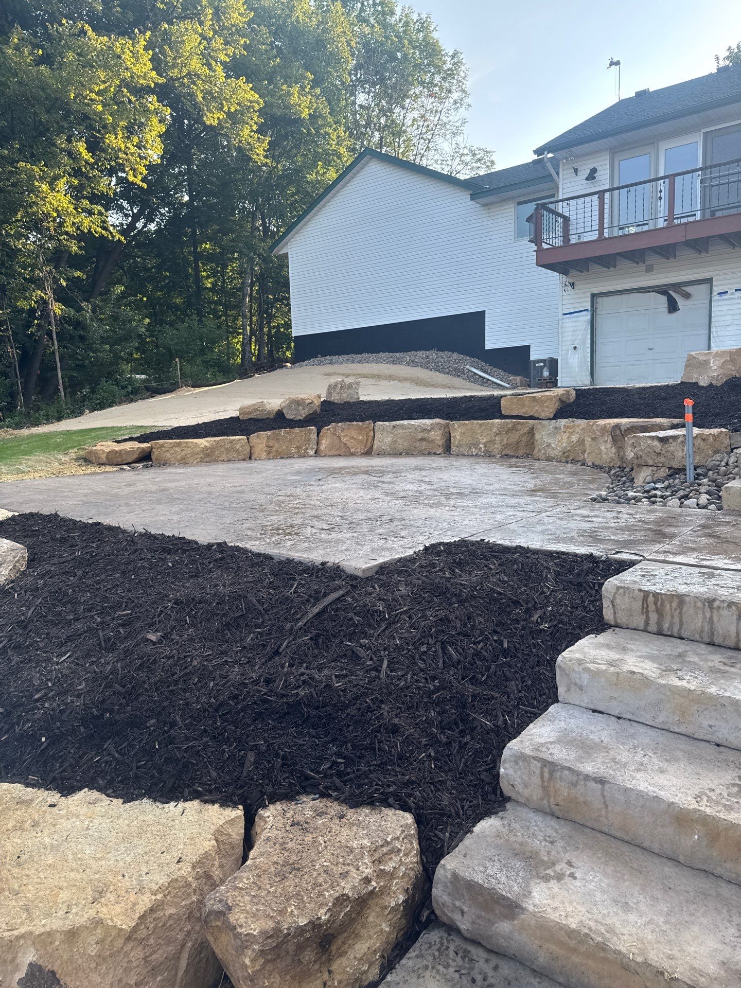Limestone Outcroppings/ Steps / Stamped Concrete by Balsam Lake Pro Lawn